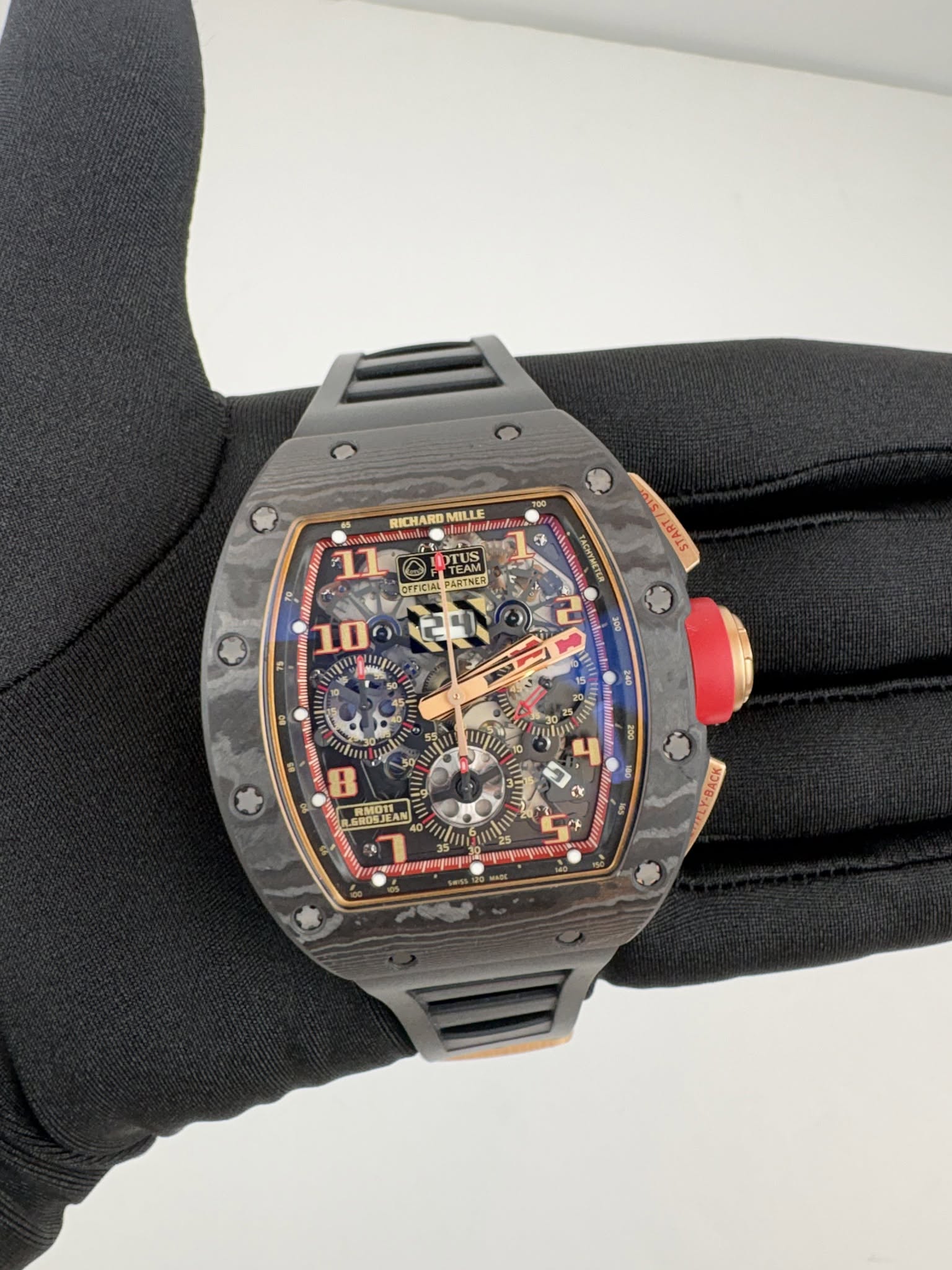 May be an image of wrist watch and text