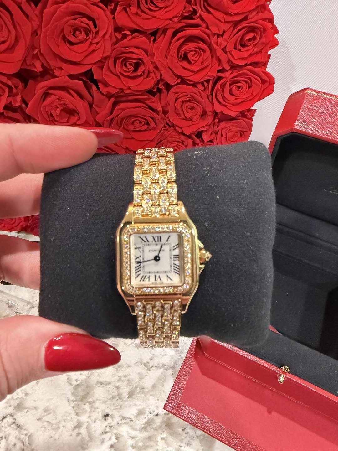 May be an image of wrist watch and text