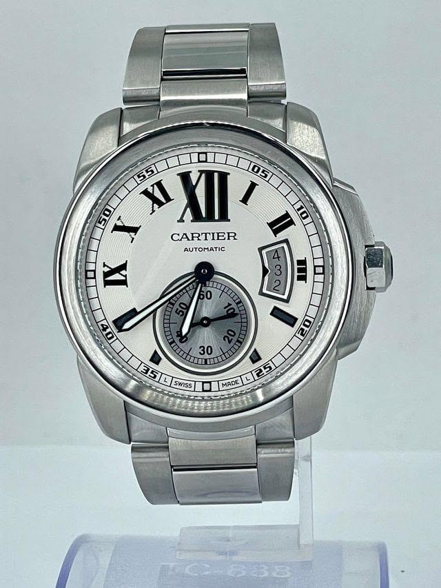 May be an image of wrist watch and text that says '50 X XI XII CARTIER II 10 AUTOMATIC IX 3 4ကလ က က II 2 0 mIun 圖四 0t 30 5 SWISS MADE L25 DE'
