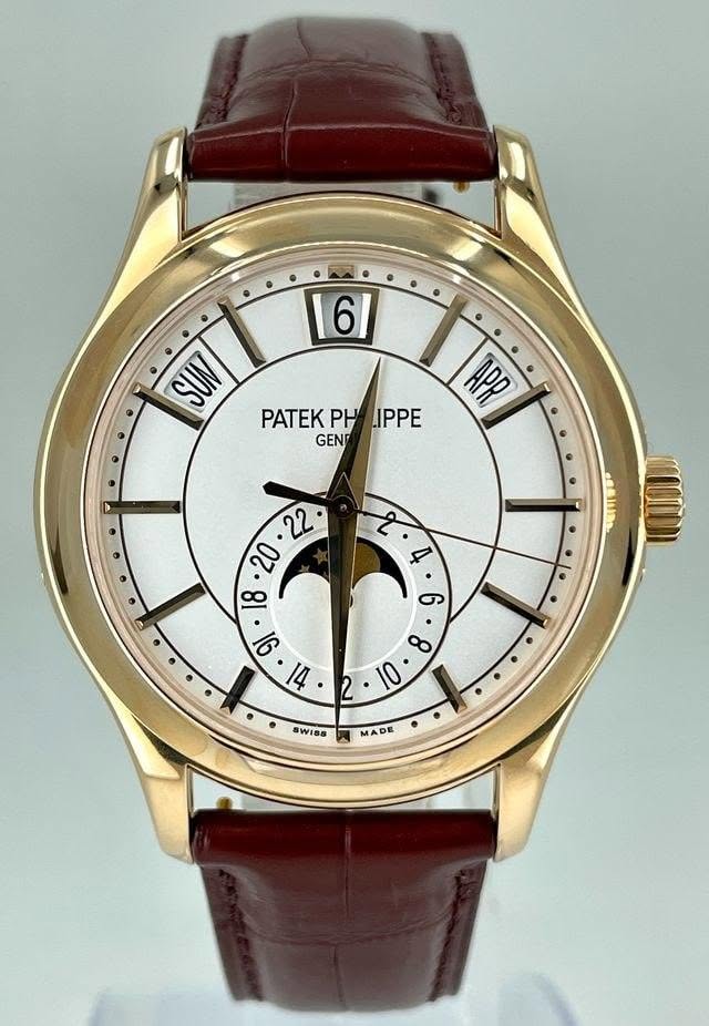 May be an image of wrist watch and text that says '161 SUN PATEK PATEKPHLIPPE PH IPPE GEND APP سوع R ול 2 10 SWiSS MADE'