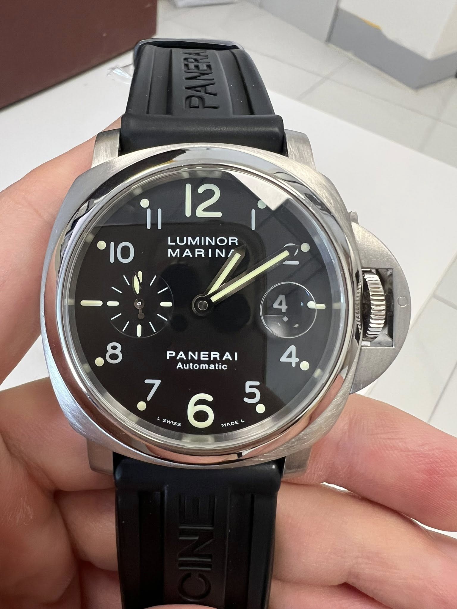 May be an image of digital watch and text that says 'il 12 I0 LUMINOR MARINA .8 PANERAI Automatic 4. 7 5 LS SWISS 76.5 S 6 MADE'