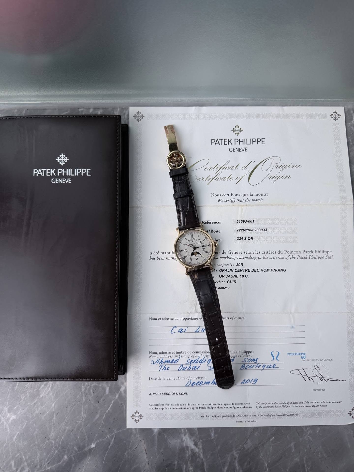 May be an image of digital watch and text