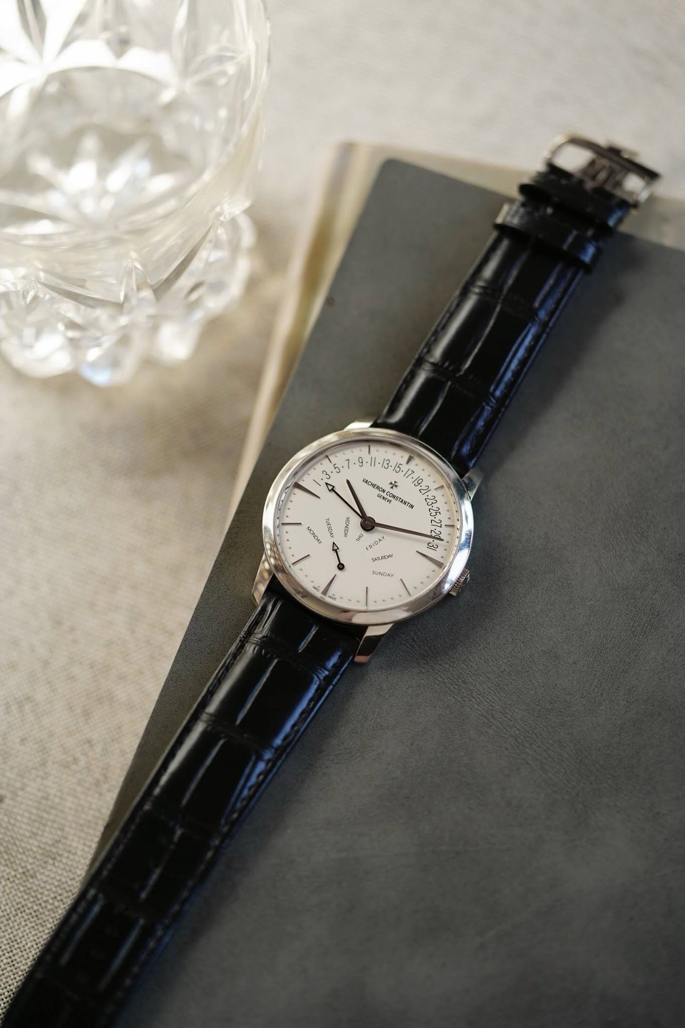 May be an image of wrist watch and text