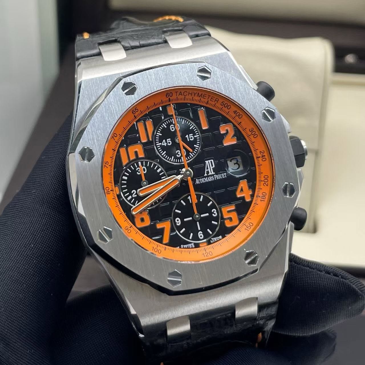 May be an image of wrist watch and text