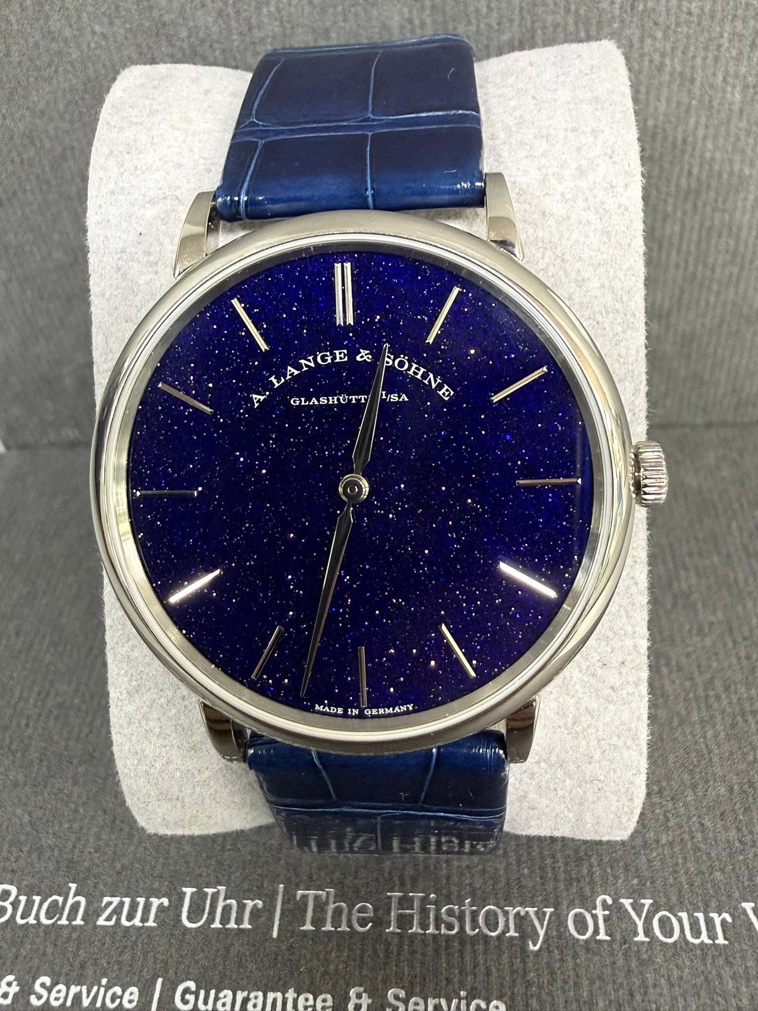 May be an image of wrist watch and text