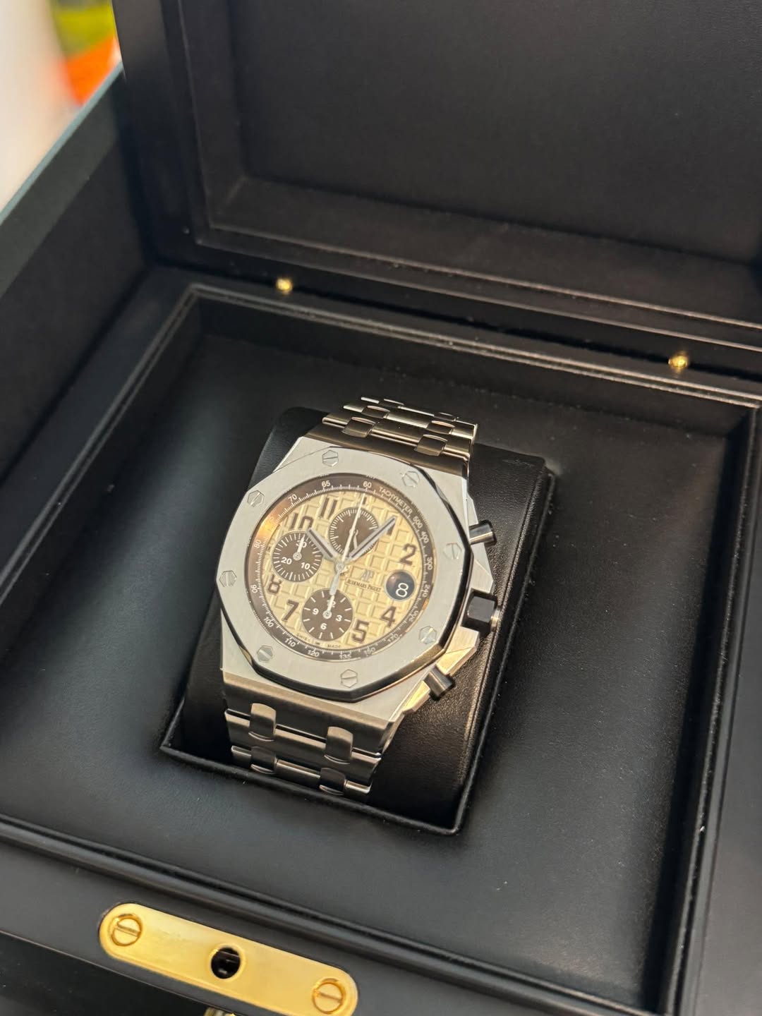 May be an image of wrist watch and text