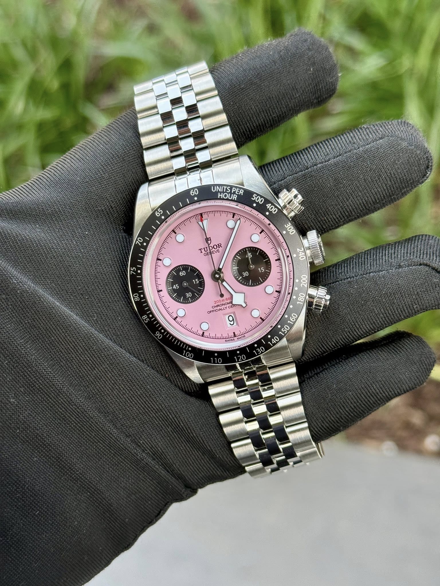 May be an image of wrist watch and text