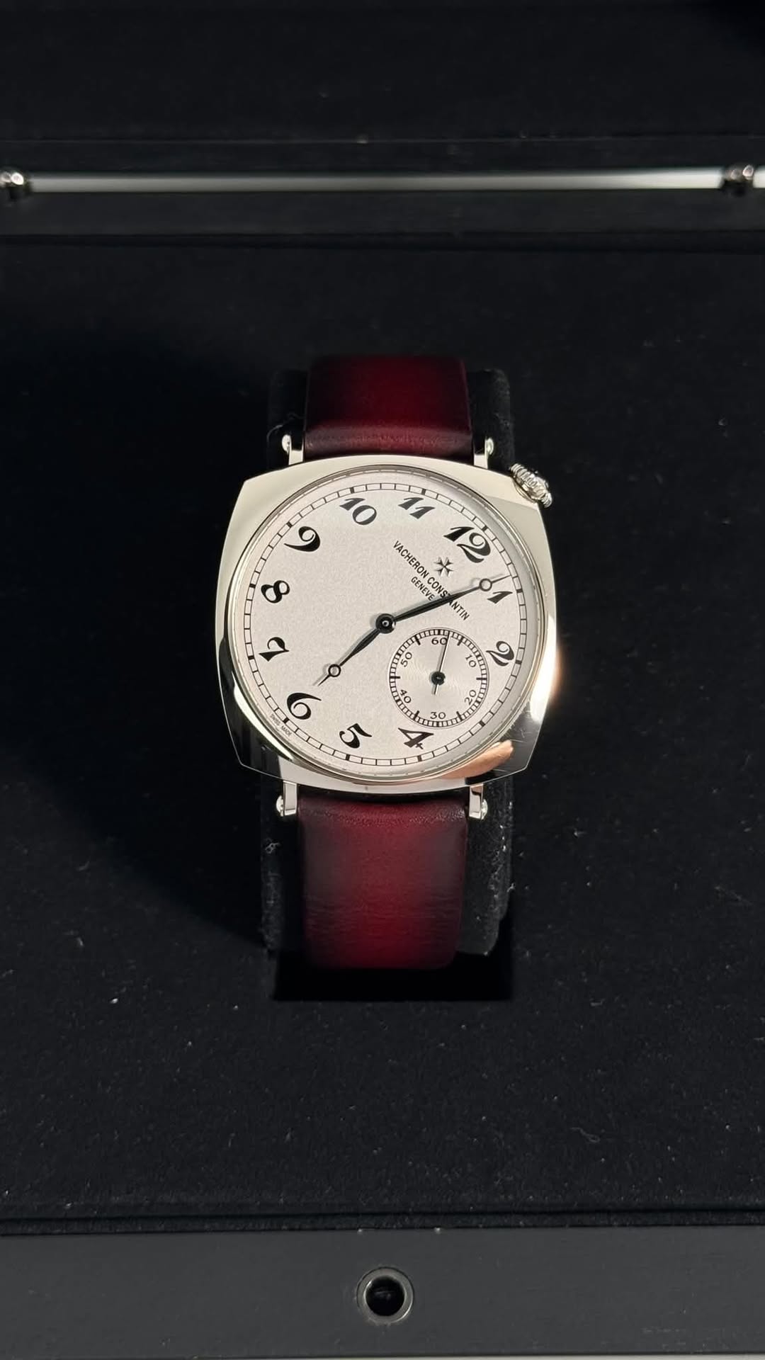 May be an image of wrist watch and text