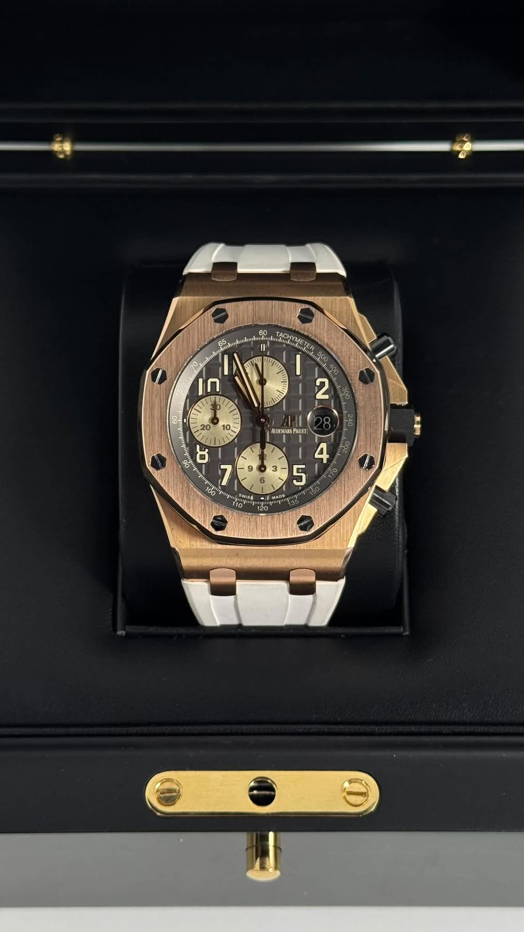 May be an image of wrist watch and text