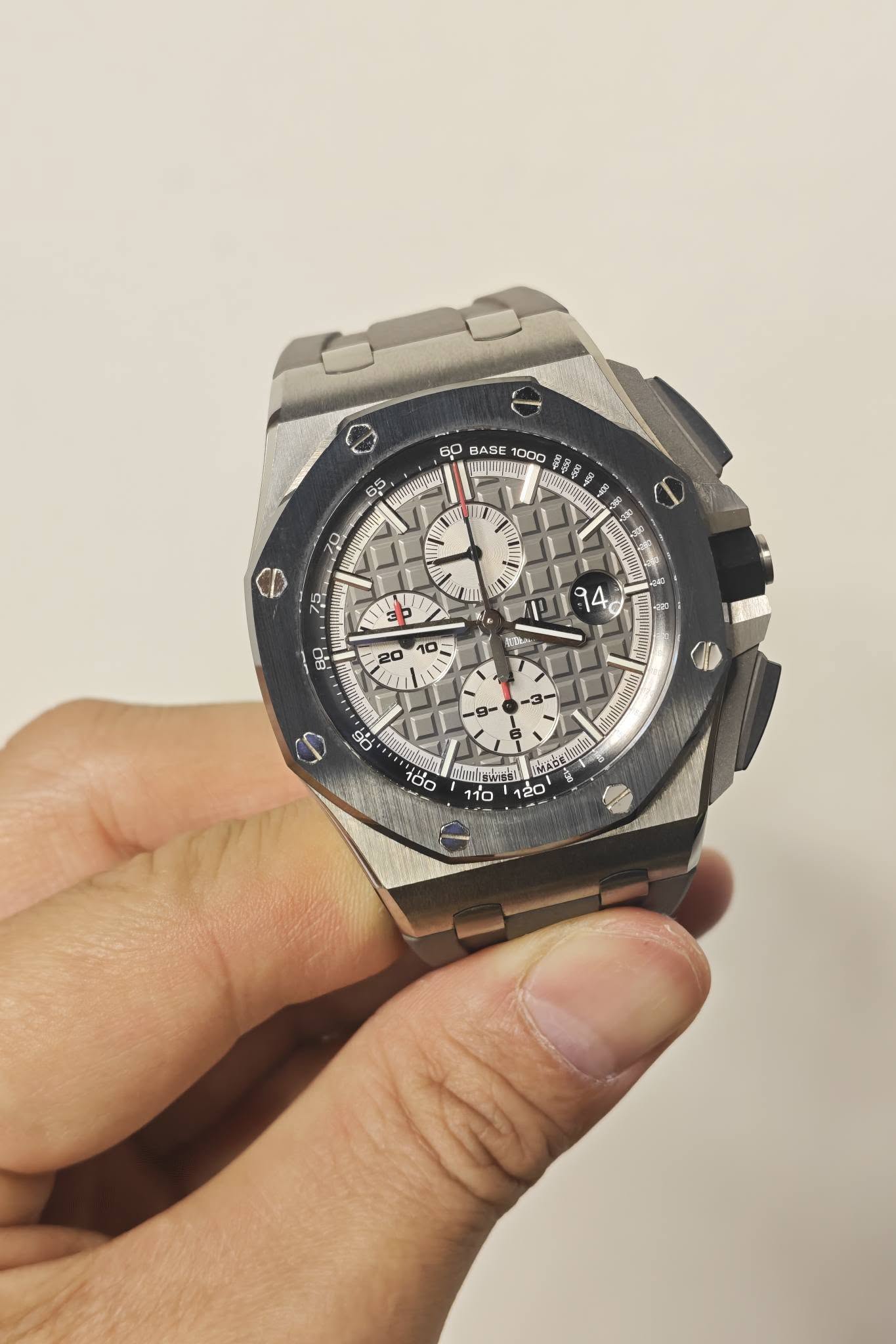 May be an image of wrist watch and text