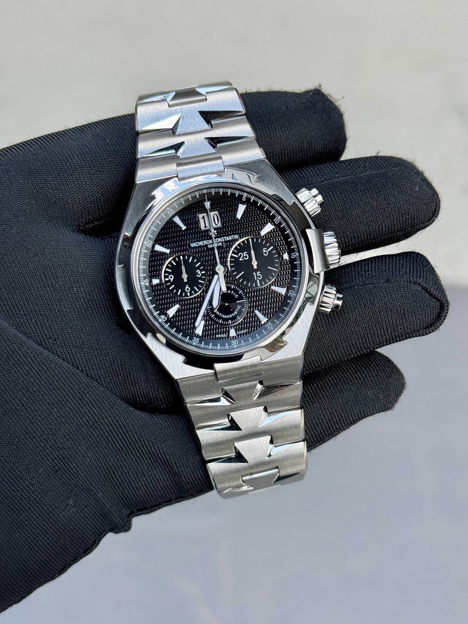 May be an image of wrist watch and text