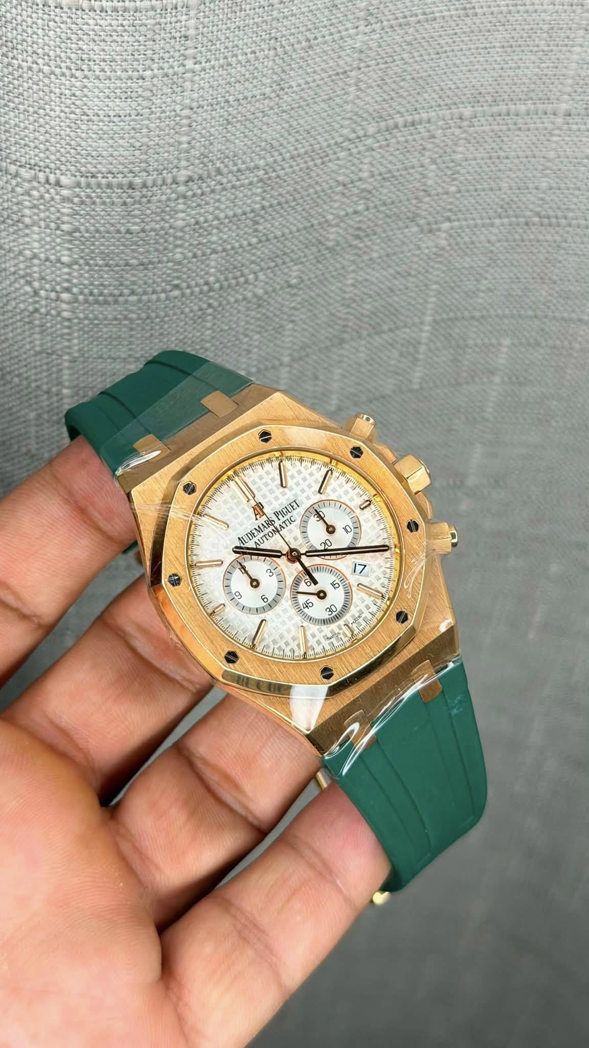May be an image of wrist watch and text