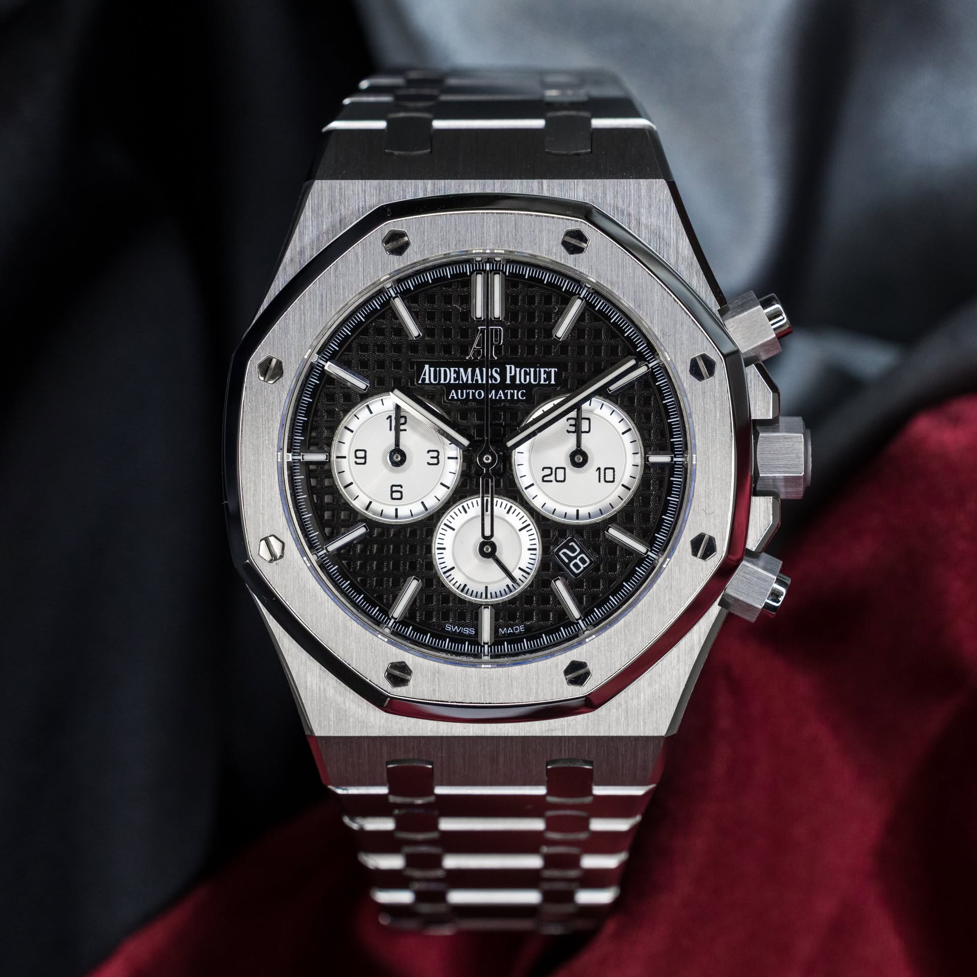 May be an image of wrist watch and text