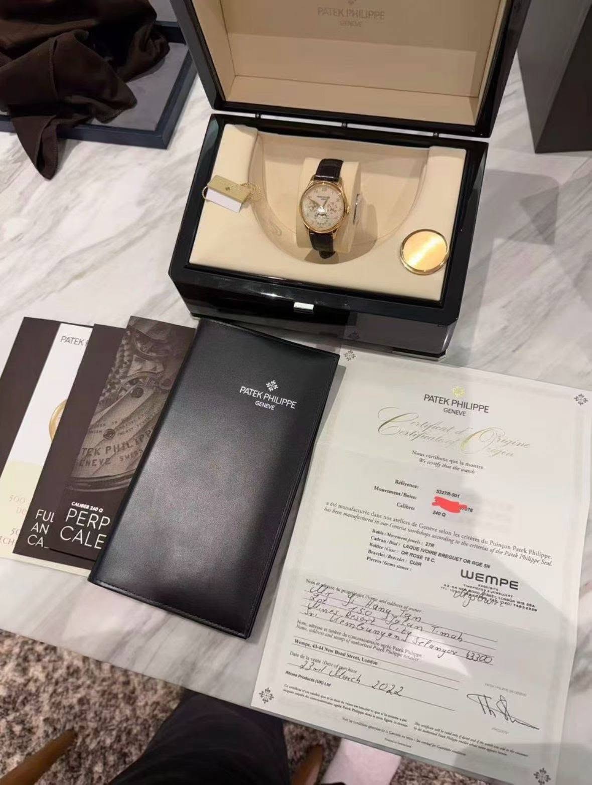 May be an image of wrist watch and text
