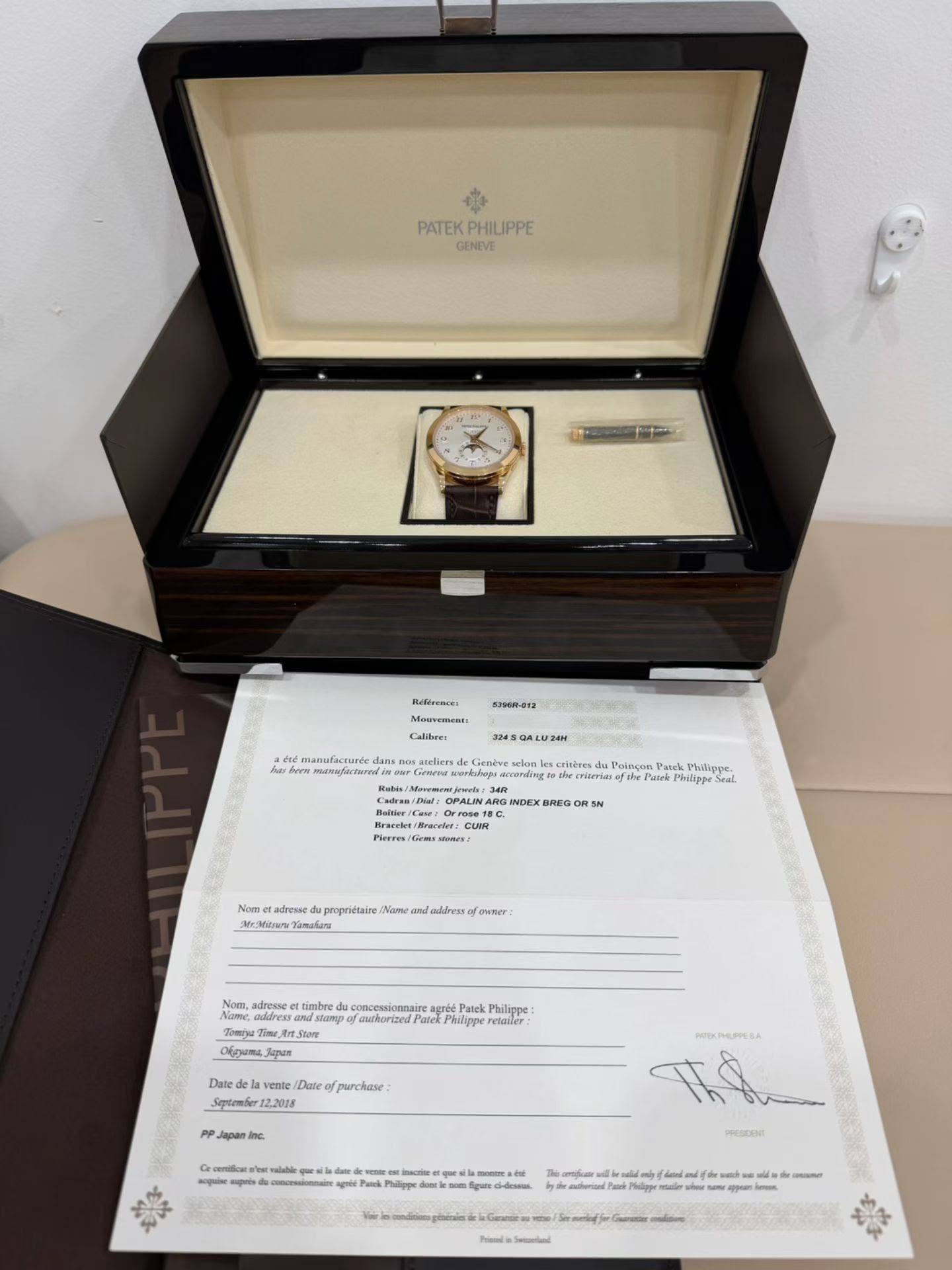 May be an image of wrist watch and text