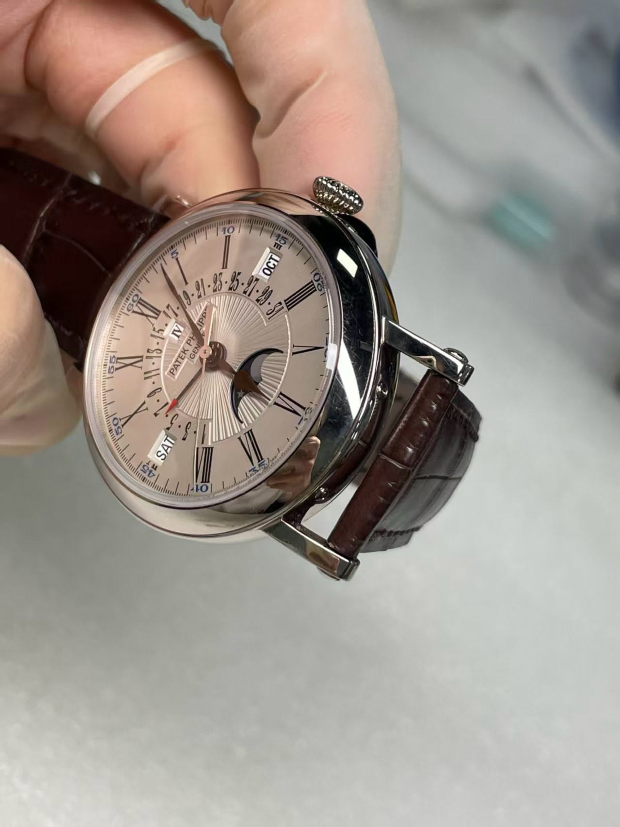 May be an image of wrist watch and text
