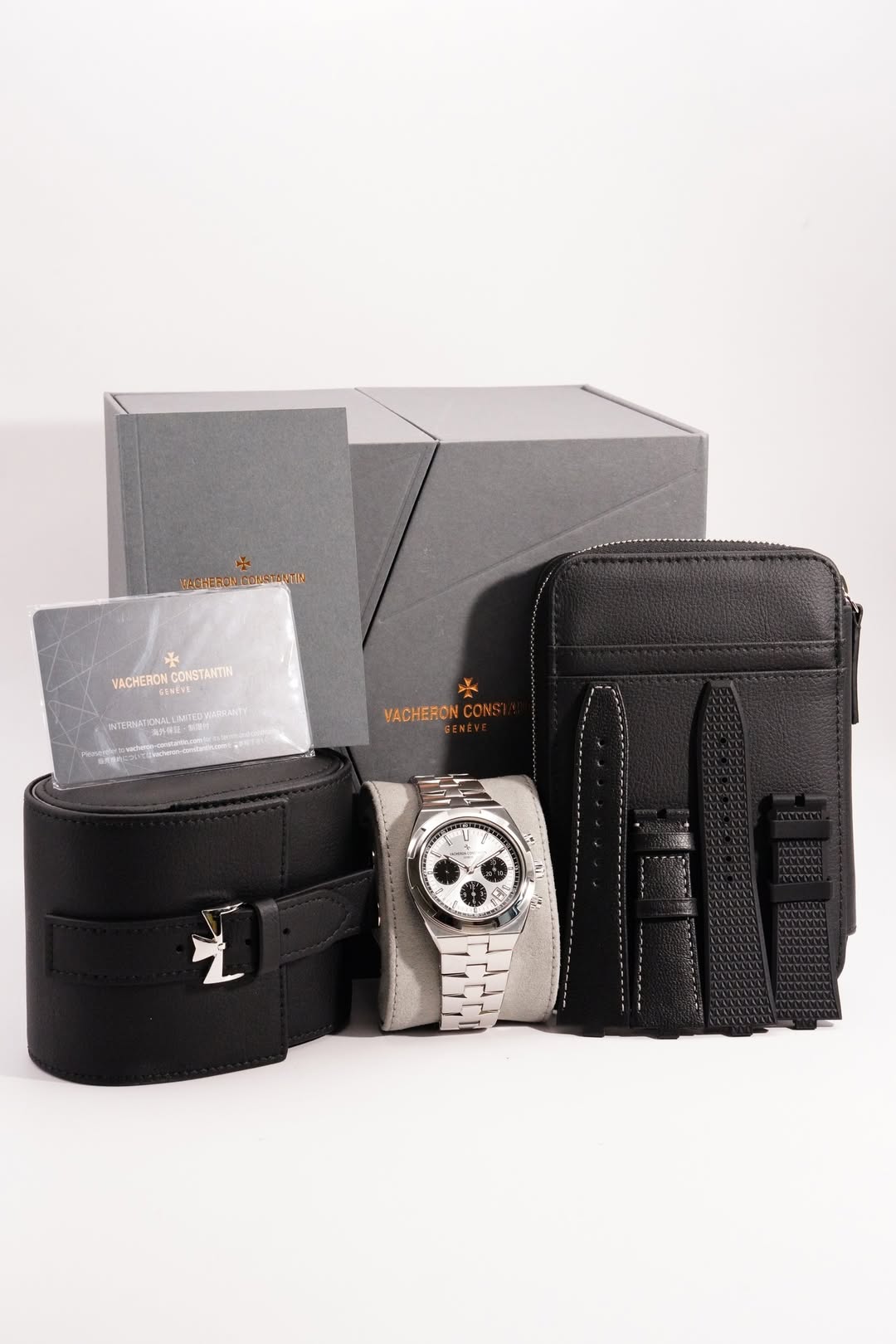 May be an image of wrist watch, saddle-stitched leather, leather wallet, leather and text