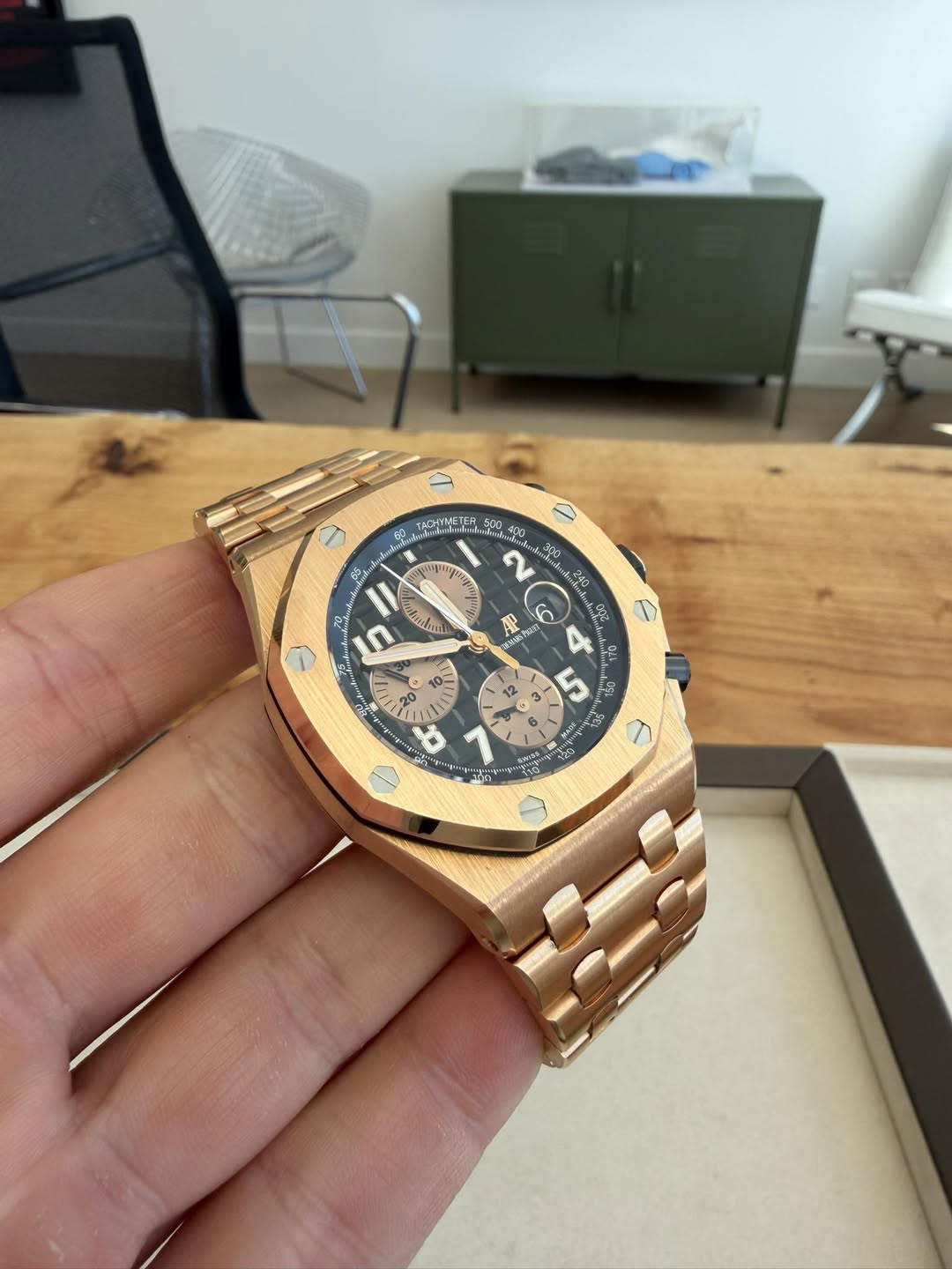 May be an image of wrist watch and text