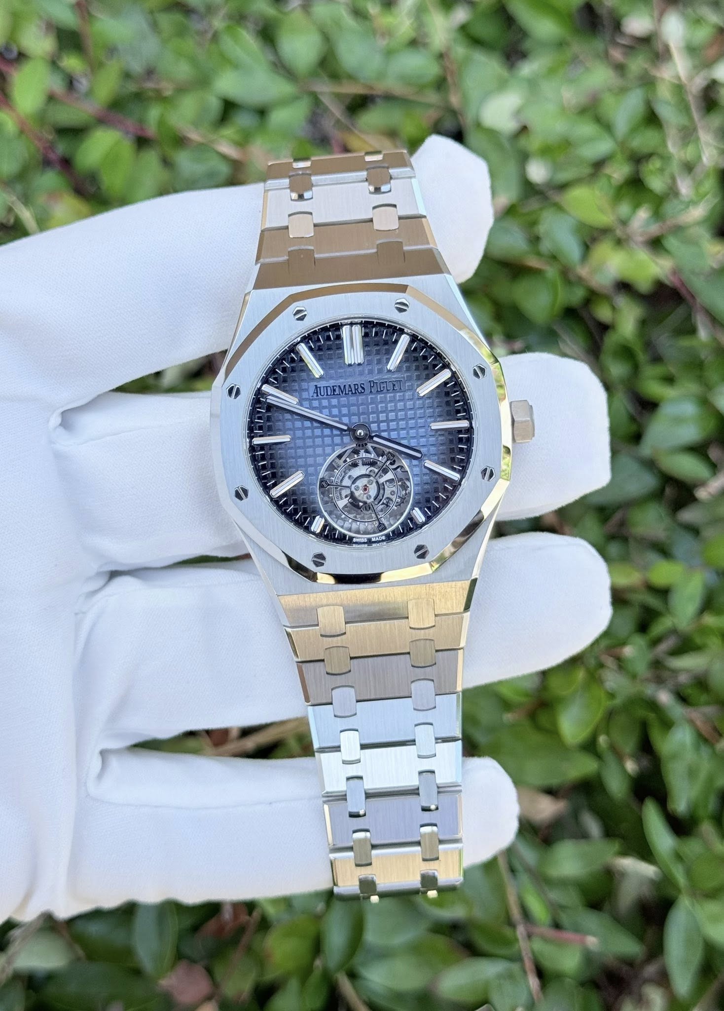 May be an image of wrist watch and text