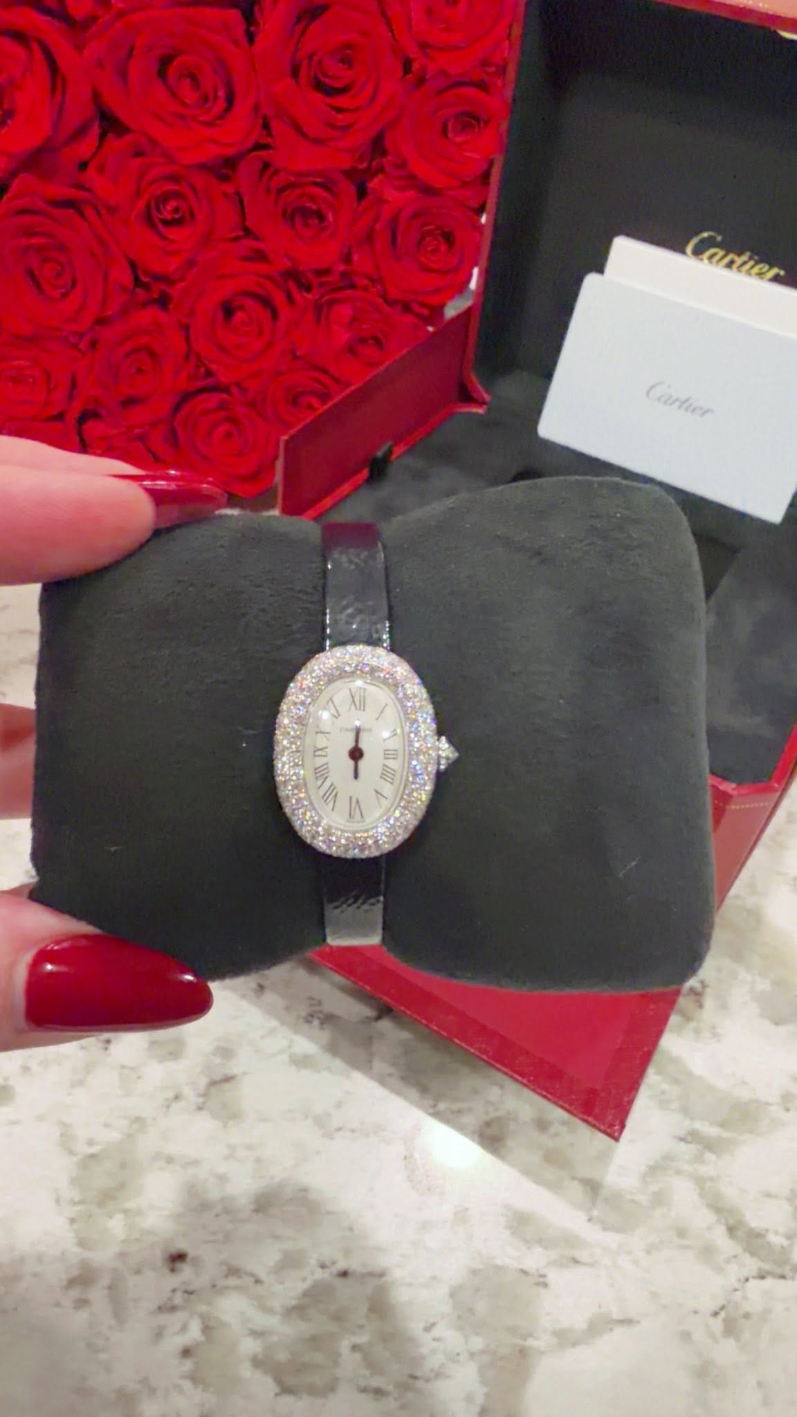 May be an image of jewelry and wrist watch