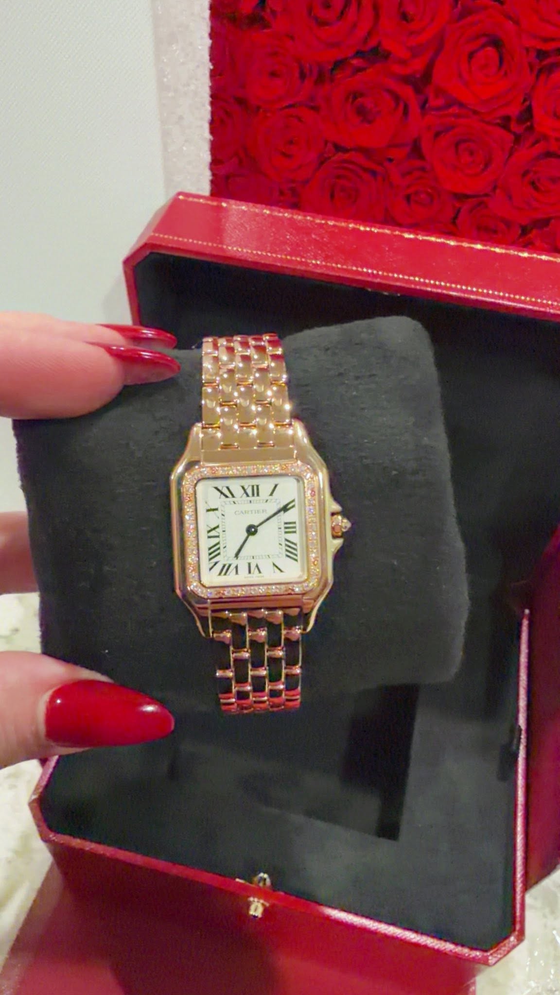 May be an image of wrist watch and text
