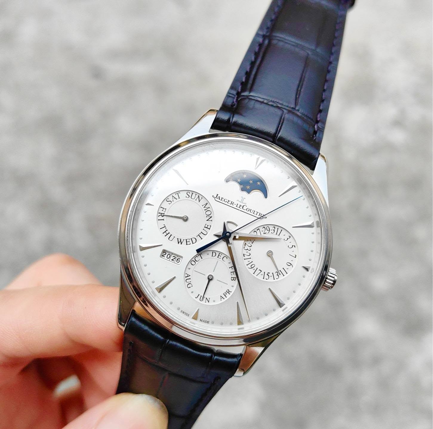 May be an image of wrist watch and text