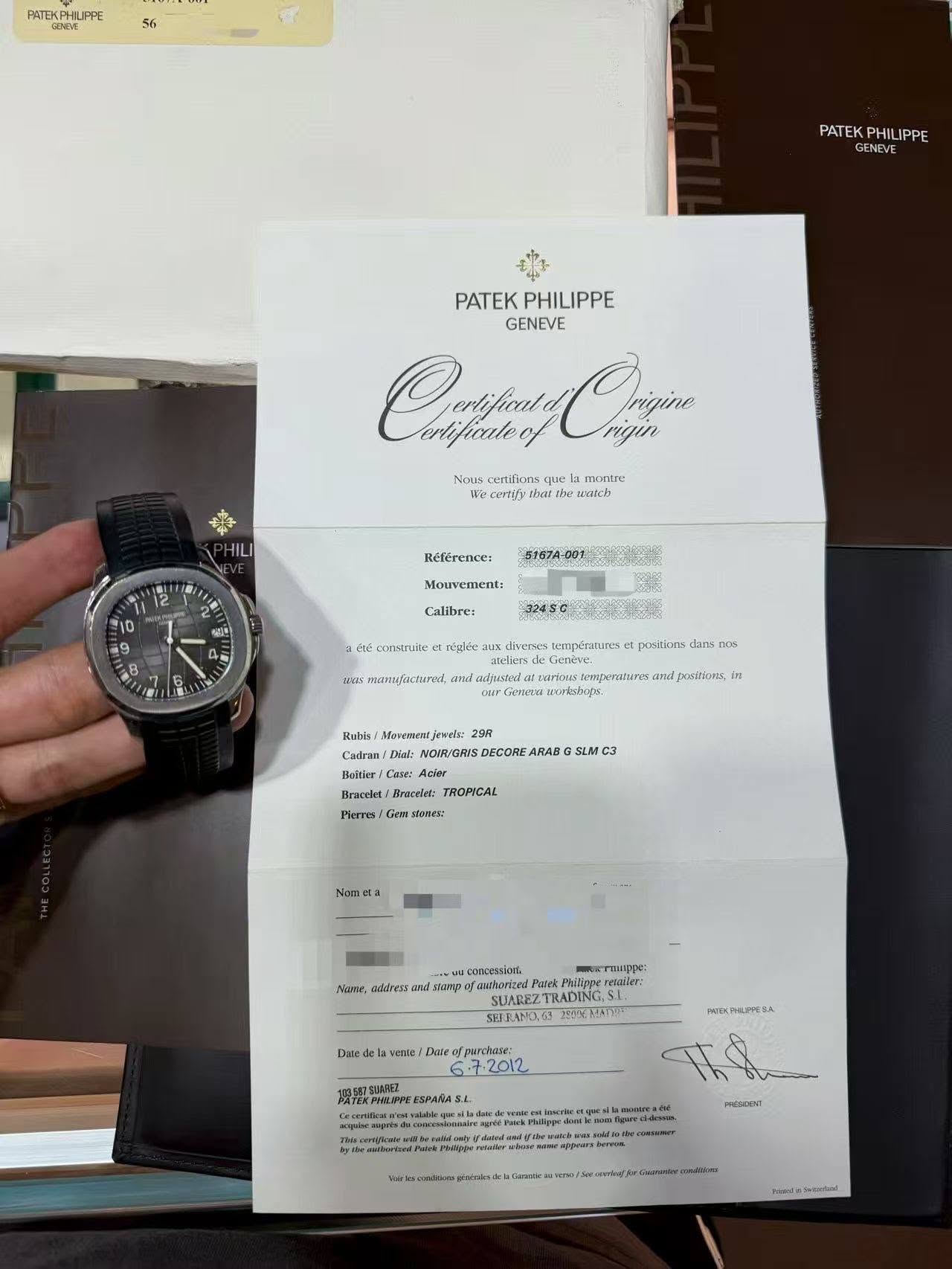 May be an image of wrist watch, ticket stub and text
