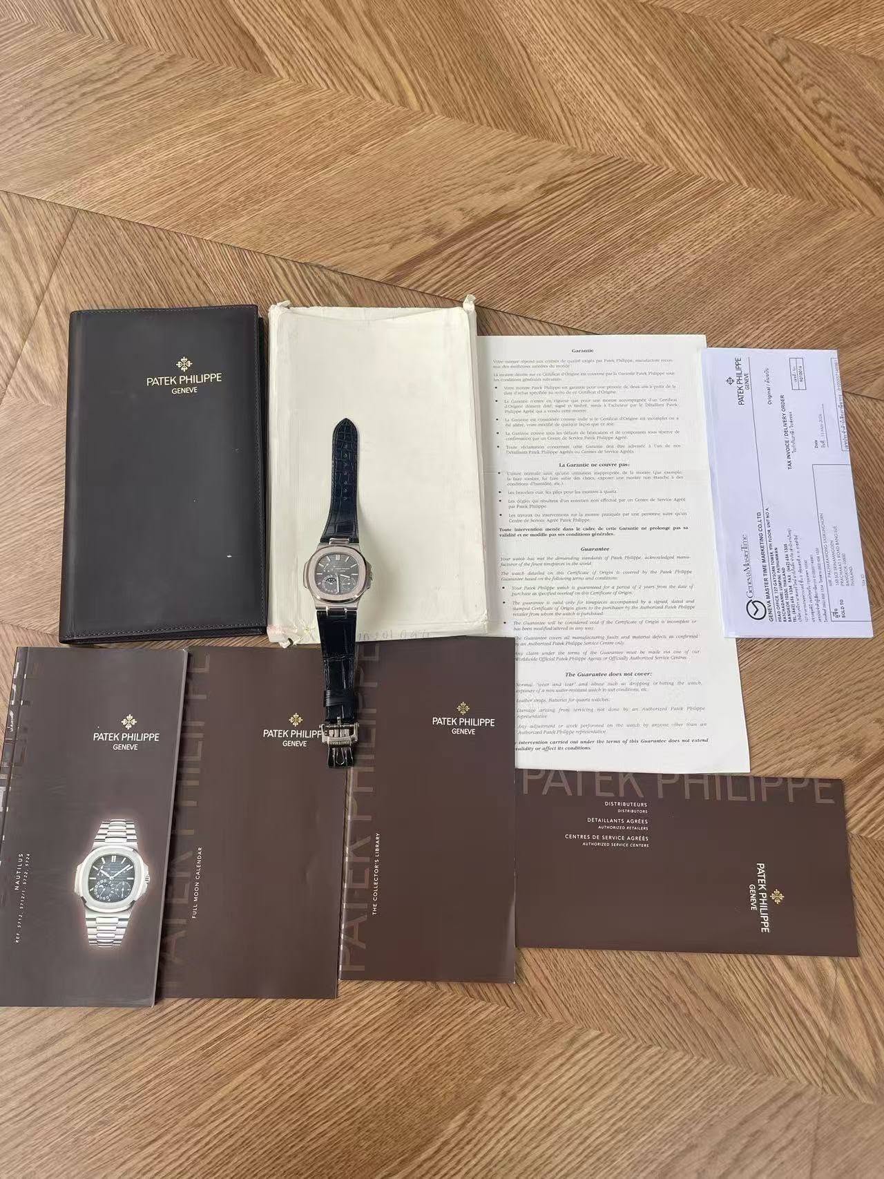 May be an image of wrist watch, diary and text