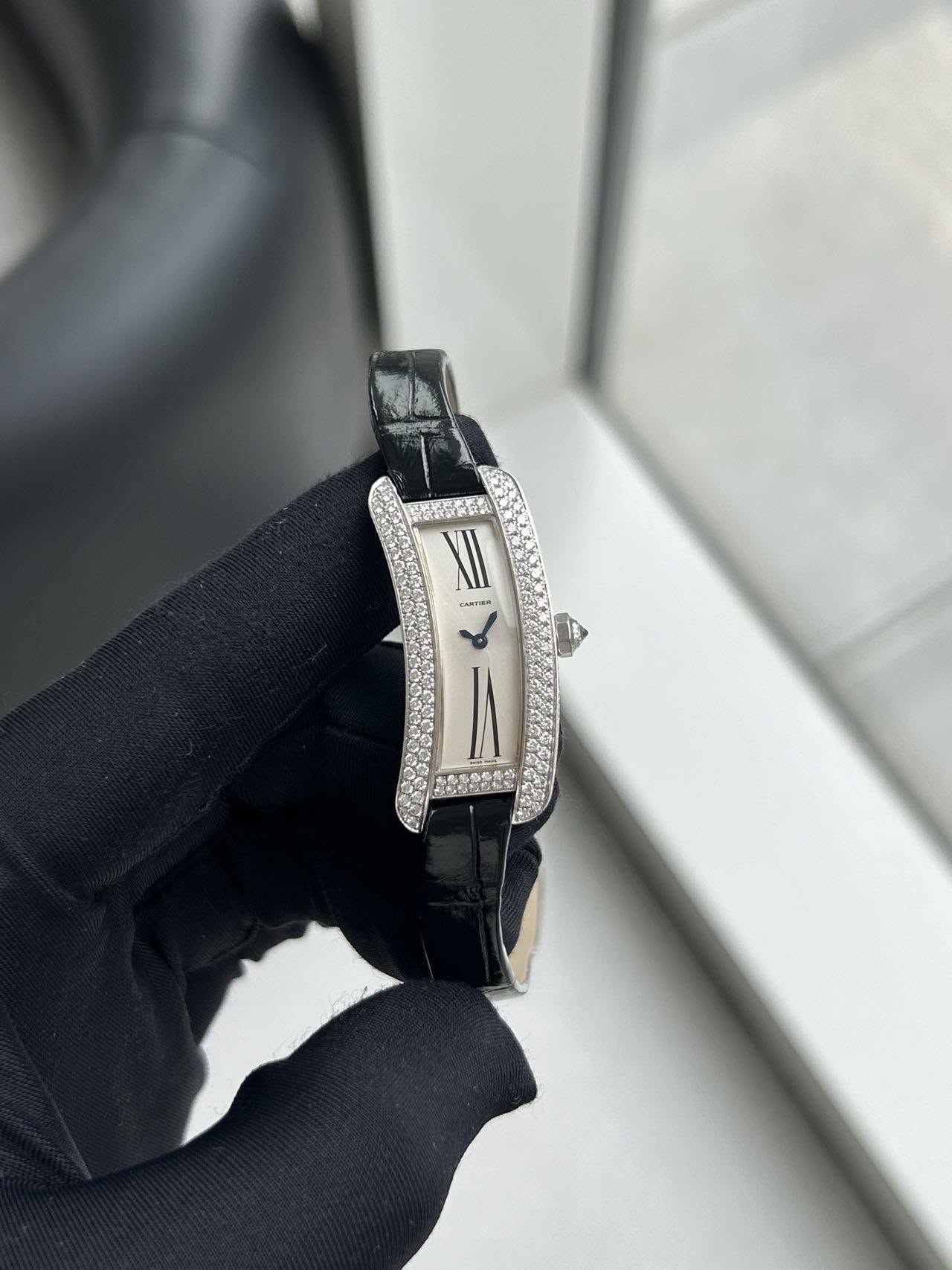 May be an image of ring, wrist watch and text