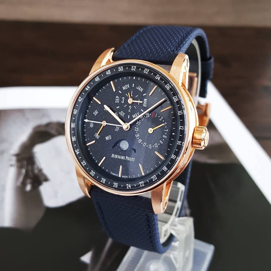 May be an image of digital watch and text that says ' NOV JAN S 40 SAT 2 MAA JUL MAY 86 物 10 3 ot! 35 参 WED 12 .٠ ٦ .0.15 ۱ي ti AUVEMARS PIGLET F 32 30 awars 28 9 8 ክ & MADE…