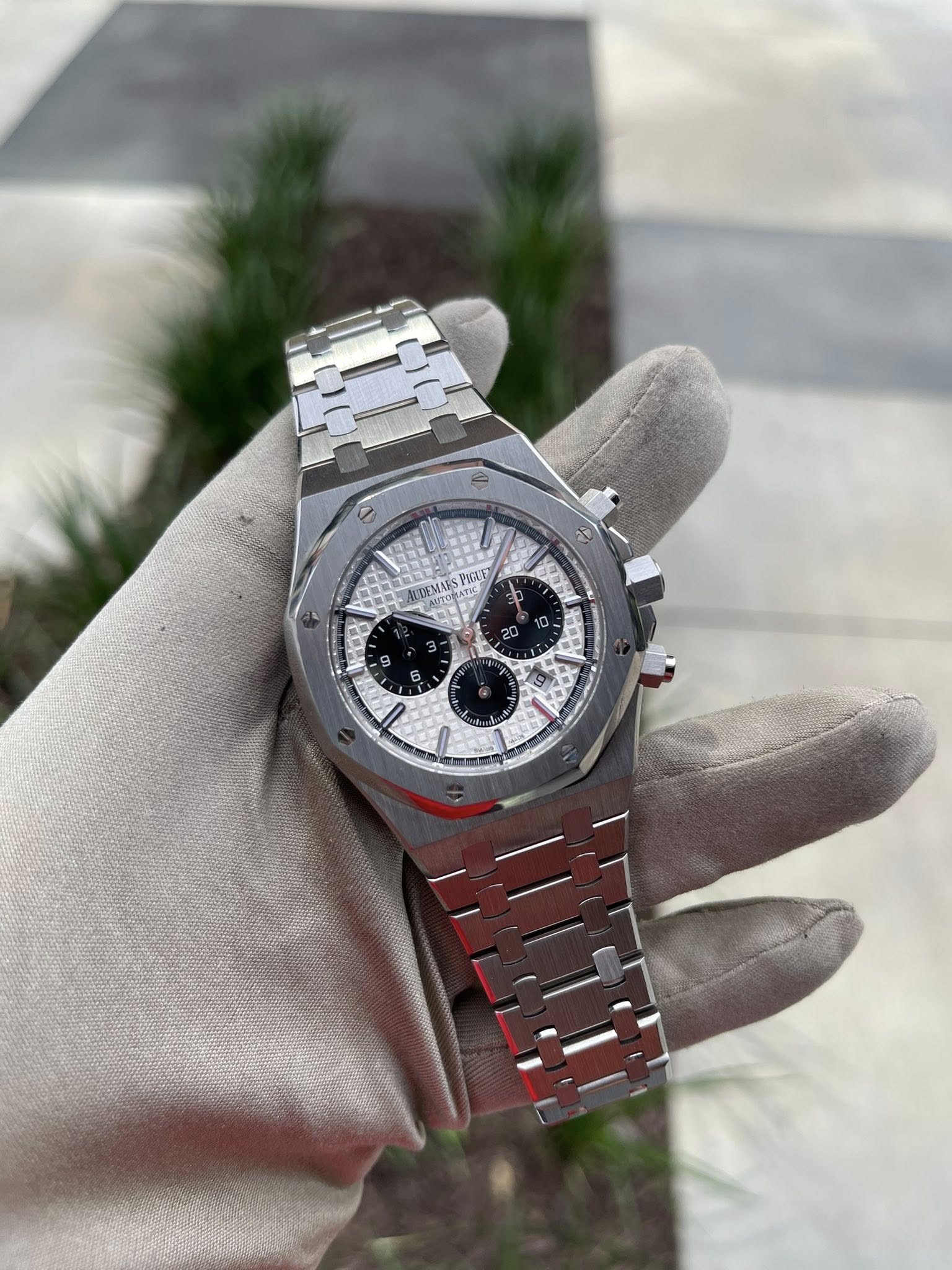 May be an image of wrist watch and text