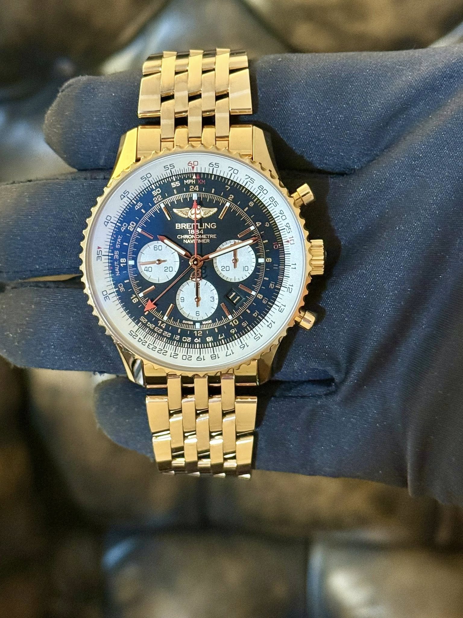 May be an image of wrist watch and text