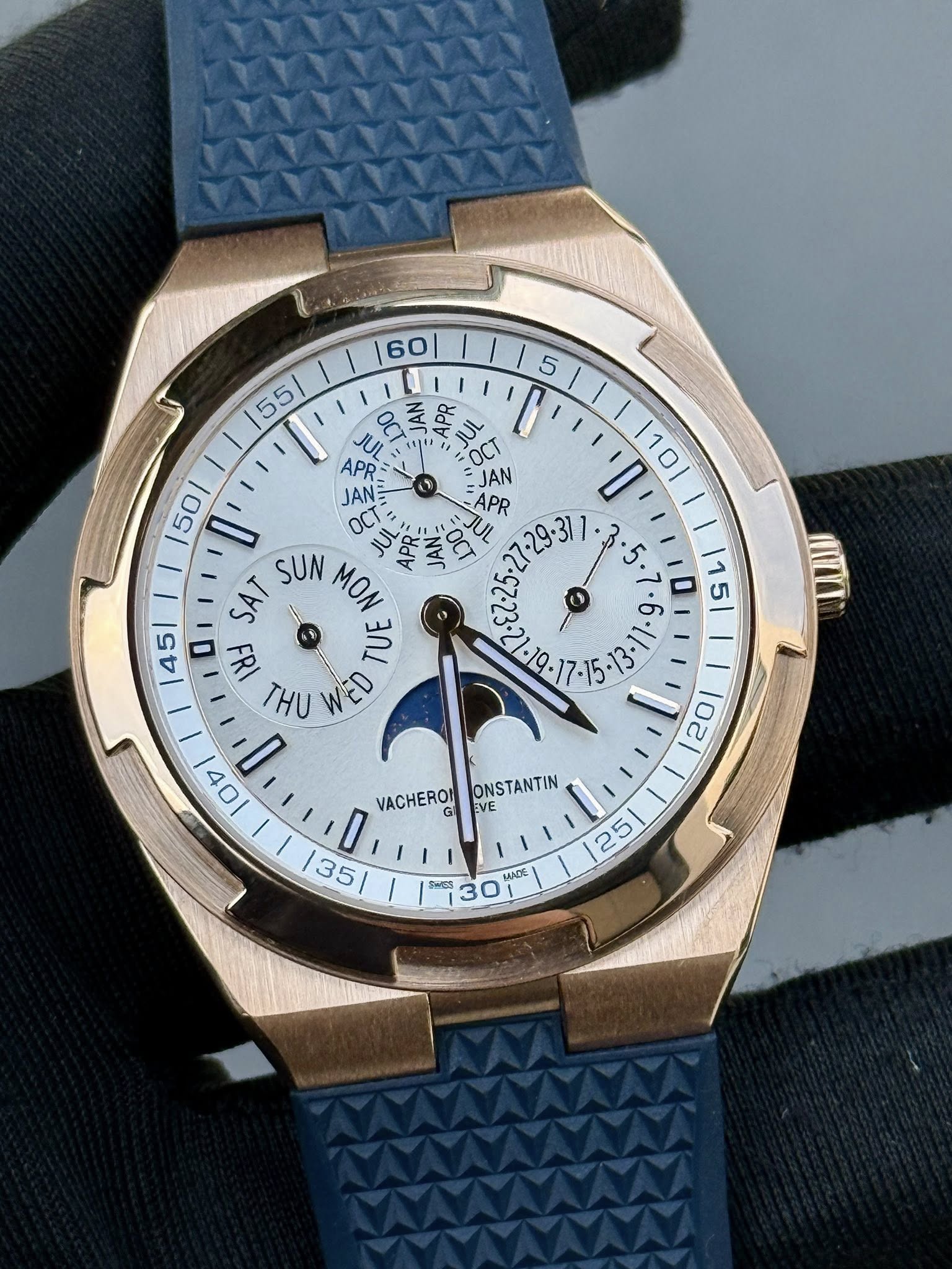 May be an image of wrist watch and text