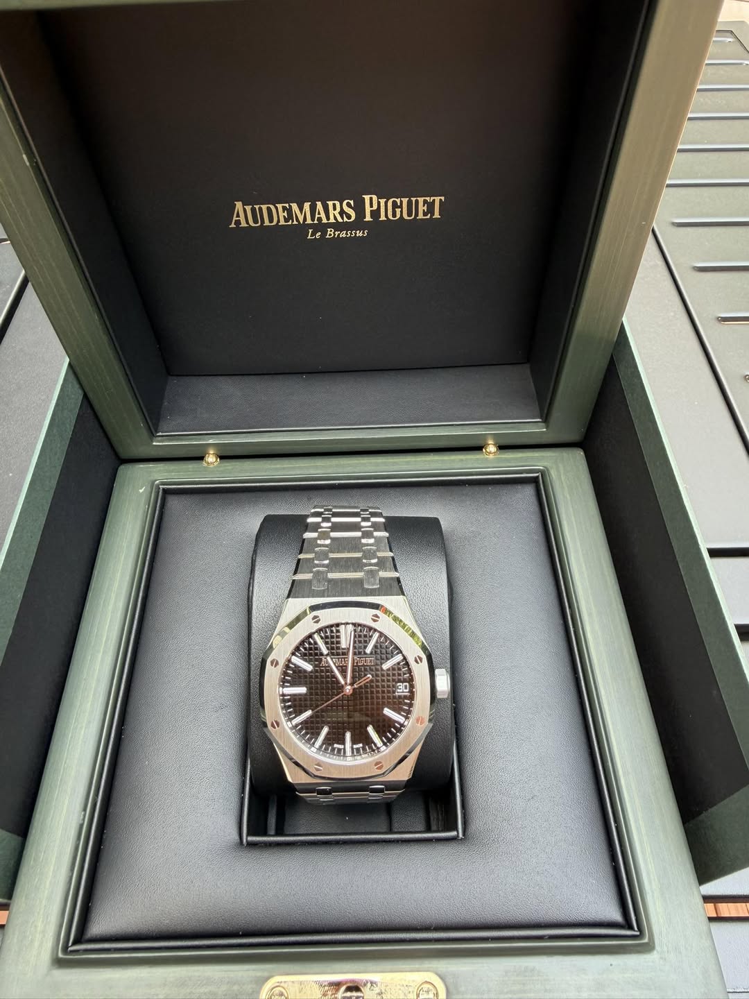 May be an image of wrist watch and text