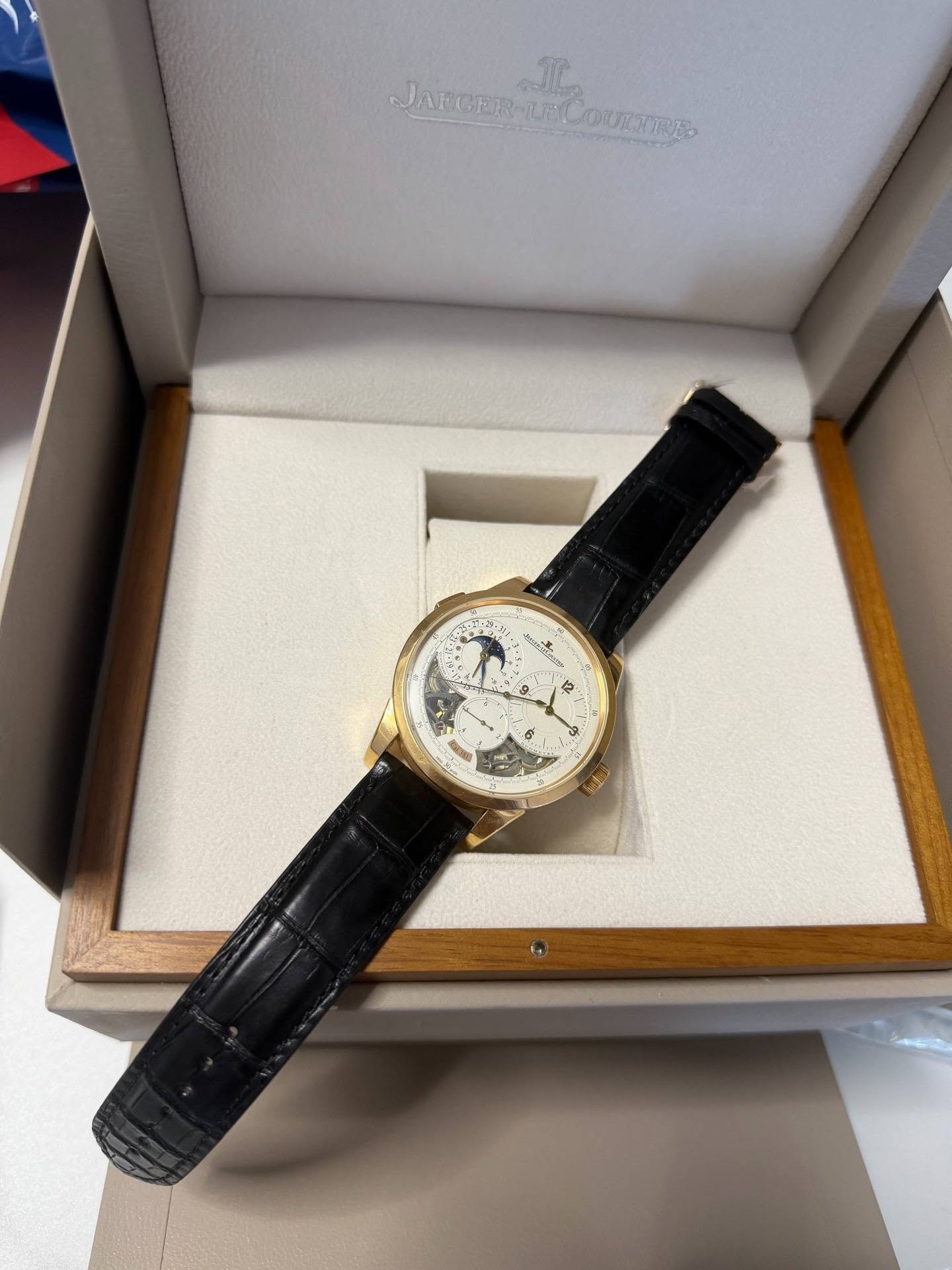 May be an image of wrist watch and text