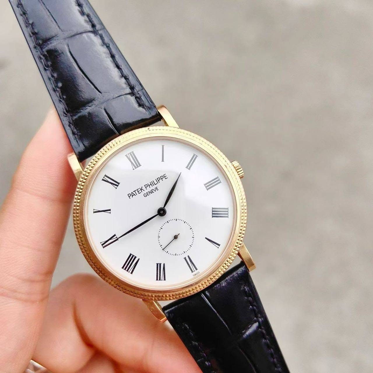 May be an image of wrist watch