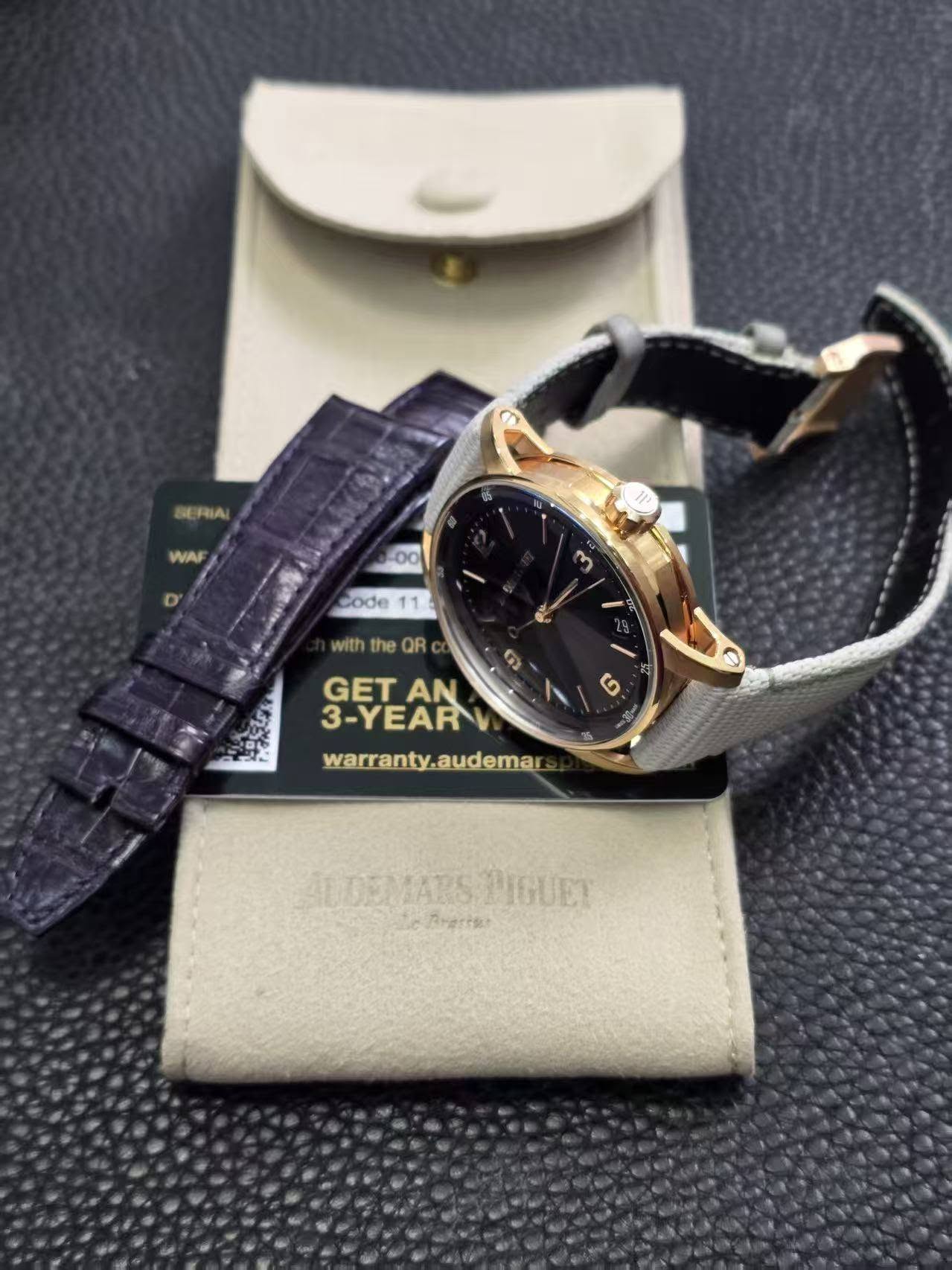 May be an image of wrist watch and text that says 'BE RIA WAF D code 11 ๓า with the QR S 0 GETAN AN GET 3-YEAR G warranty.audemars AUDEMARS 4UDEMARSPIGUET 40 PIGUET 3Hpи'