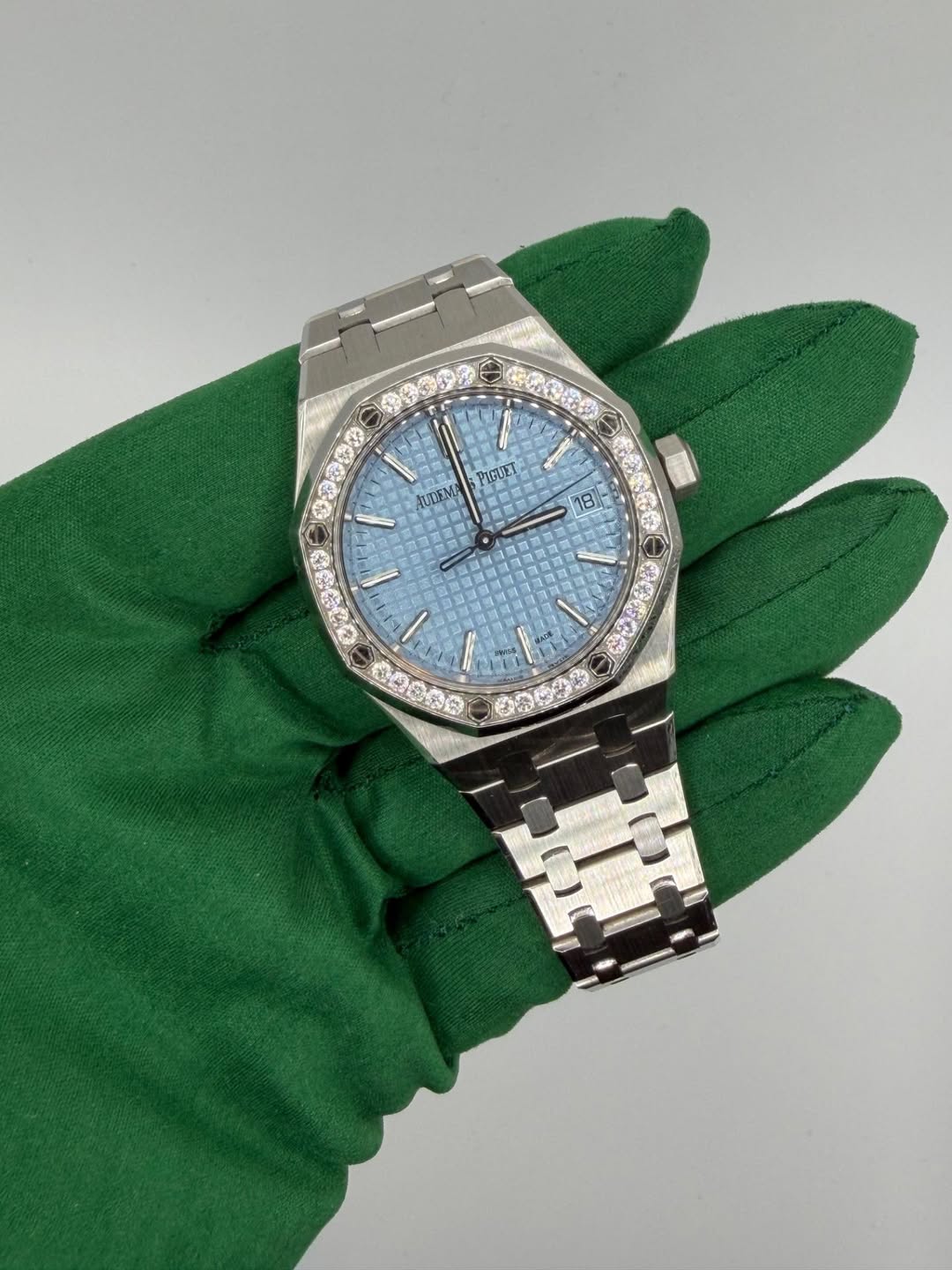 May be an image of wrist watch and text