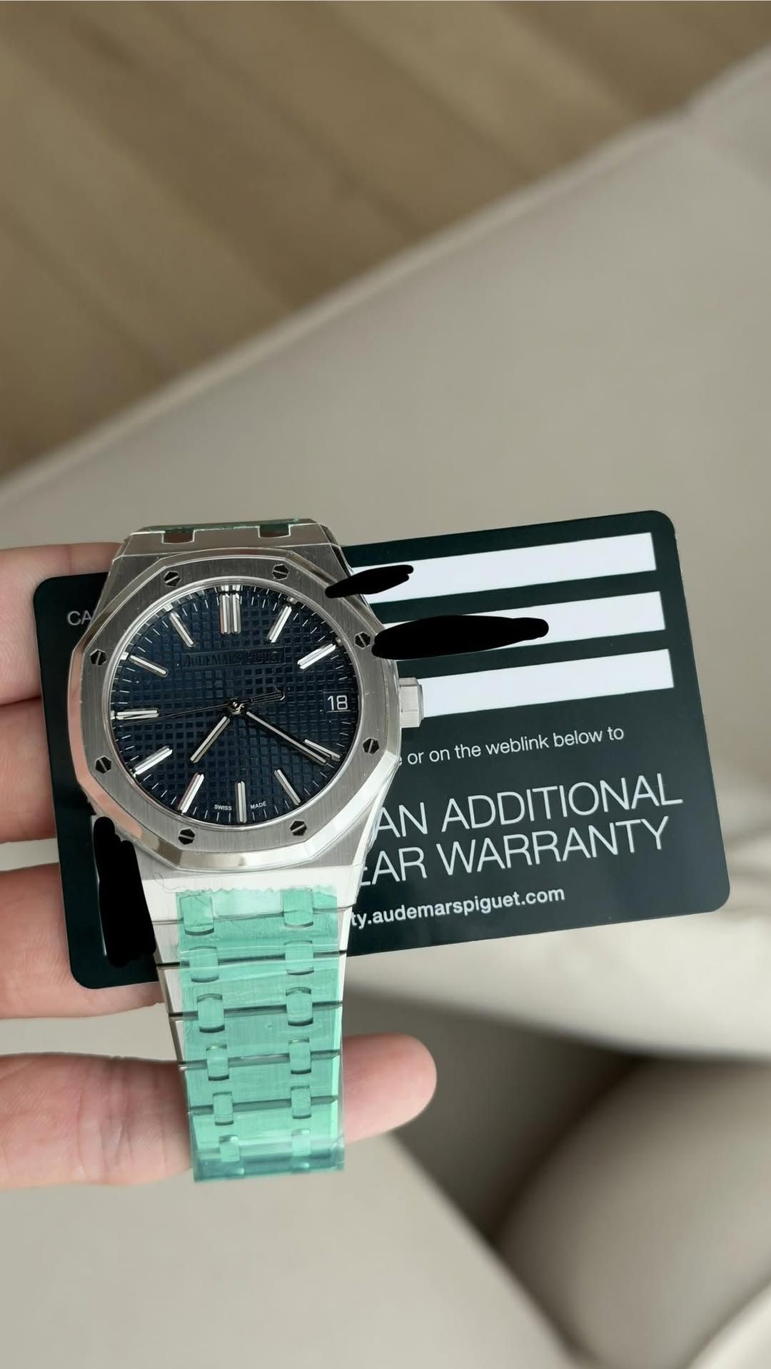 May be an image of wrist watch and text