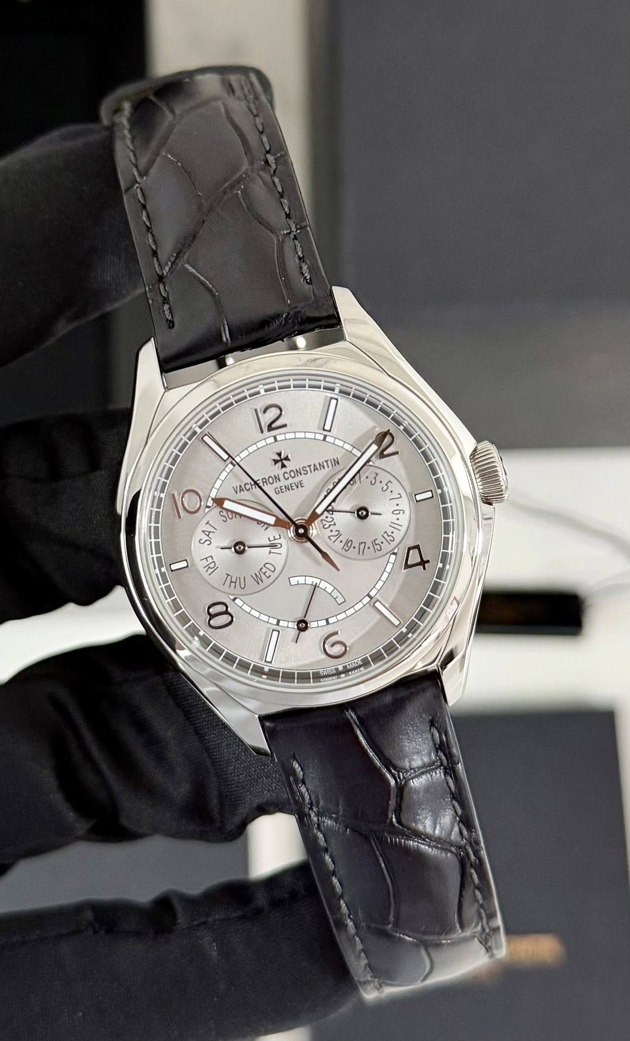 May be an image of wrist watch and text