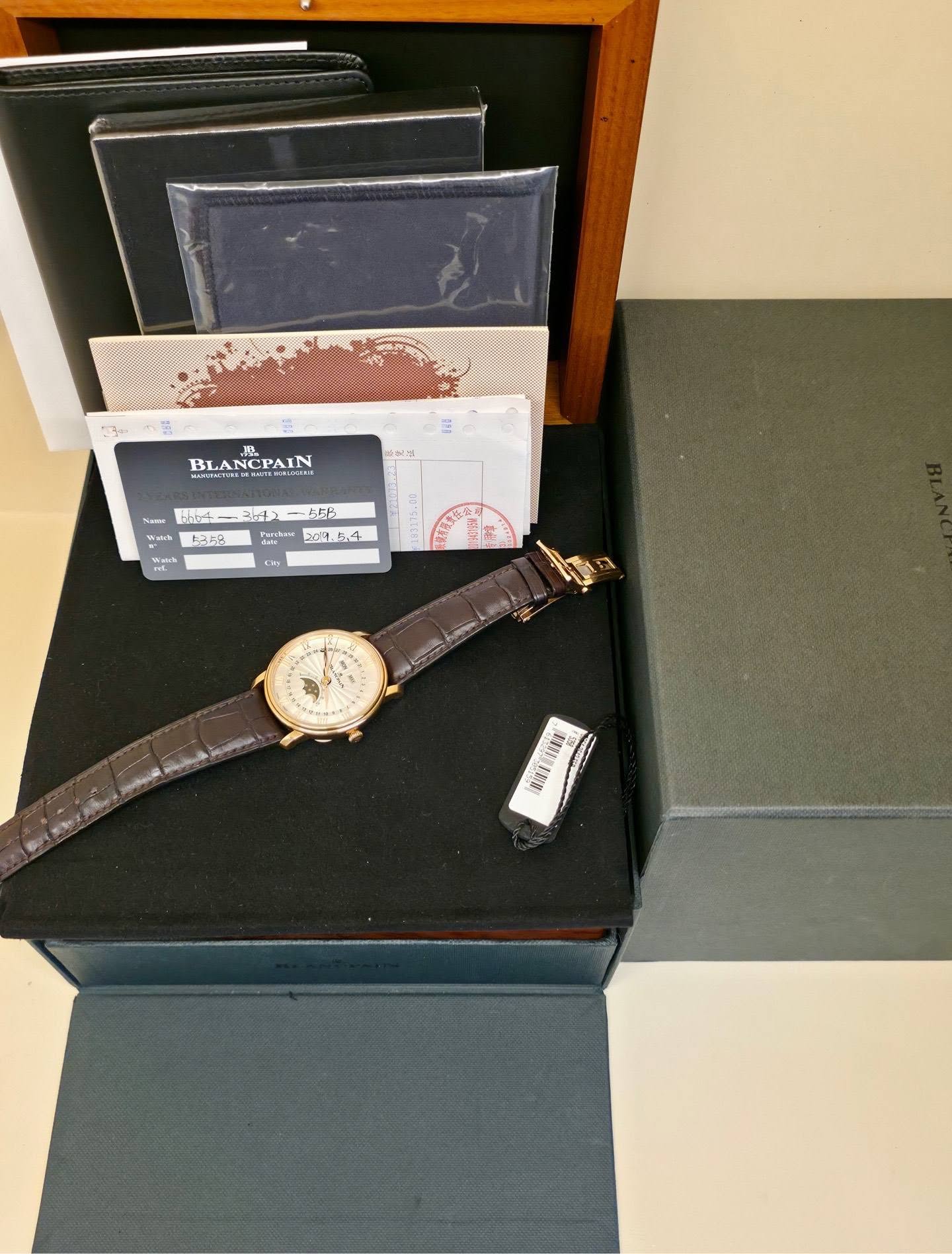 May be an image of wrist watch, leather, cufflinks and text