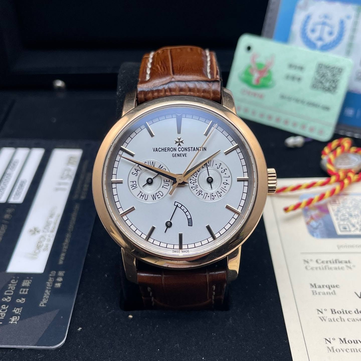 May be an image of wrist watch and text