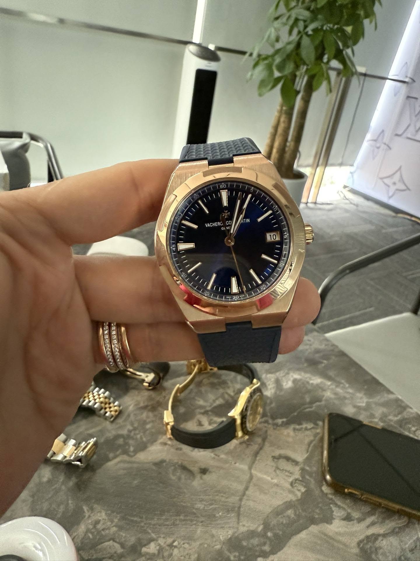 May be an image of wrist watch and text