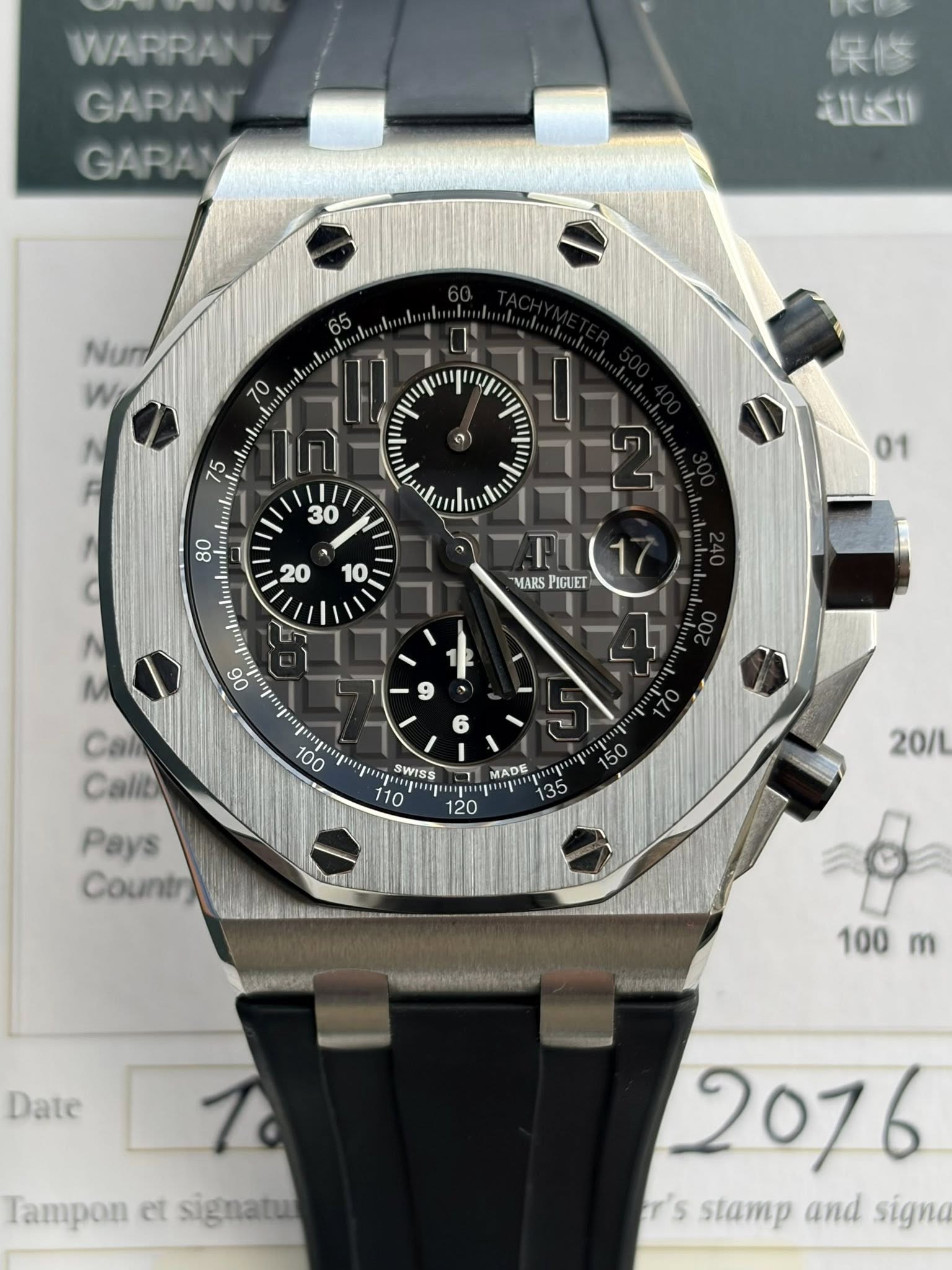 May be an image of wrist watch and text that says 'WARRAN GARAN GARAY 保修 الكفالة Nur W 70 UI . MARS F1(17 PIGUET Cal Calit Pays Countr) MADE ogees SWISS 110 ት 120 20/L MoAИHaeo…