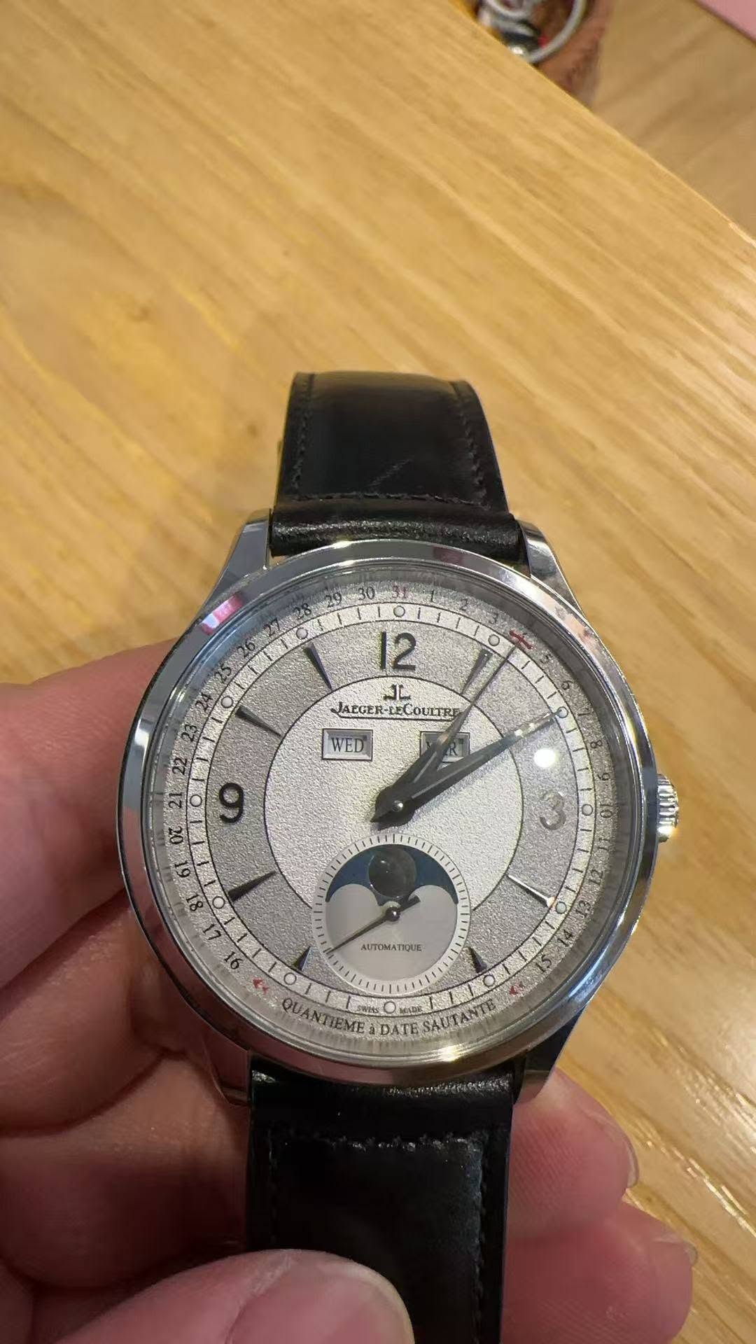 May be an image of wrist watch and text