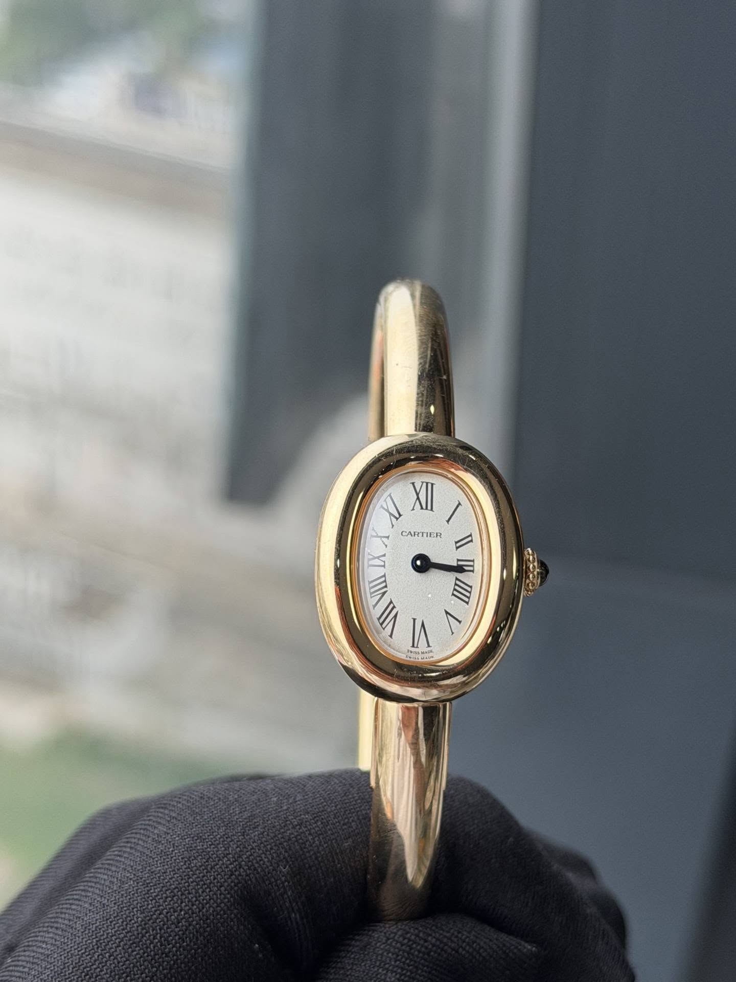 May be an image of wrist watch, ring and text