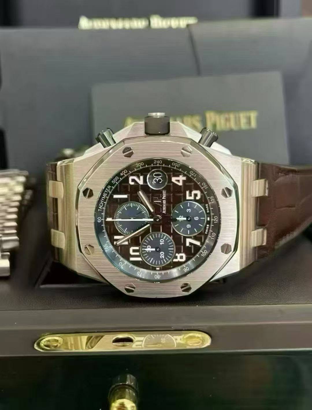 May be an image of wrist watch and text