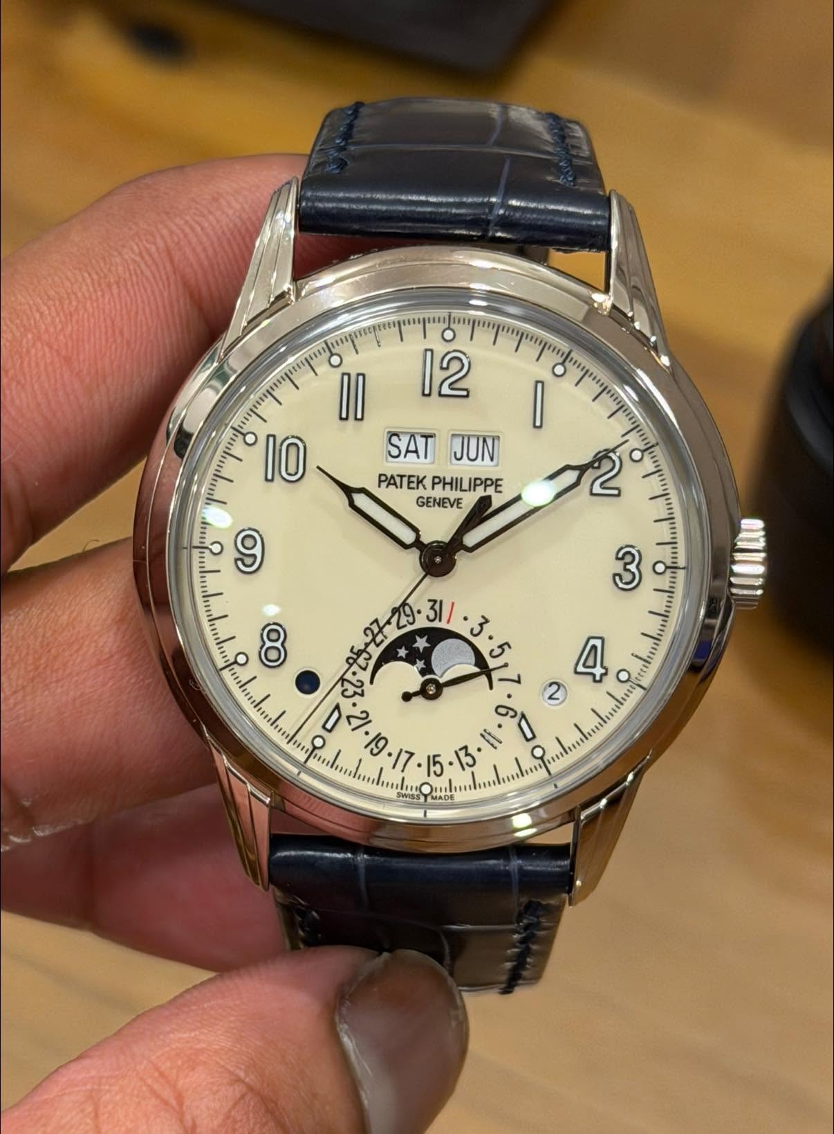 May be an image of wrist watch and text