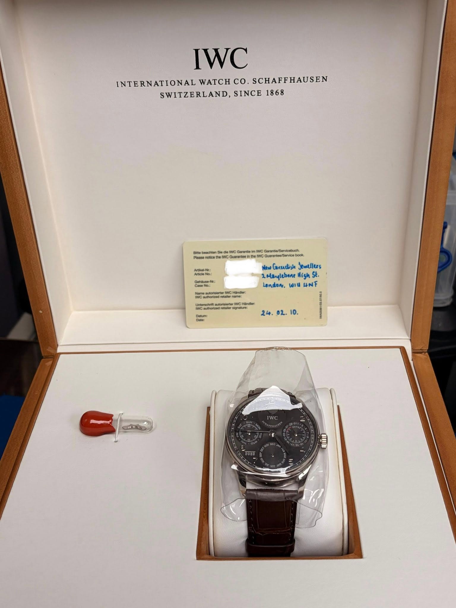 May be an image of wrist watch and text
