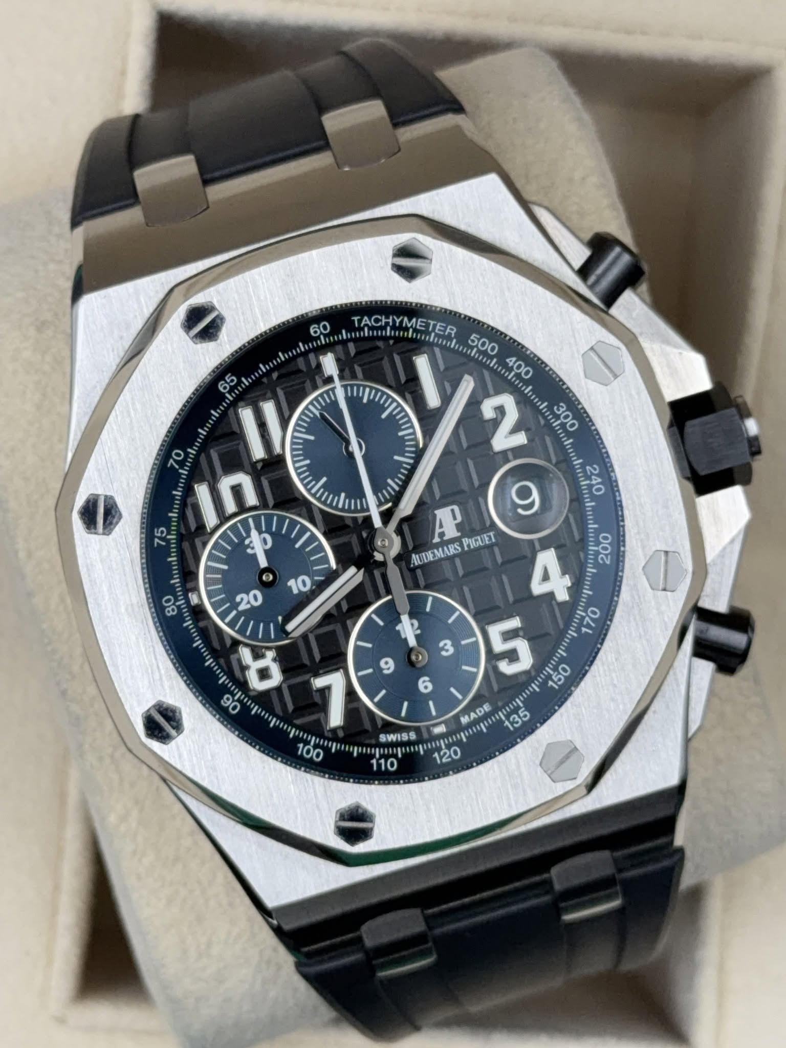 May be an image of wrist watch and text